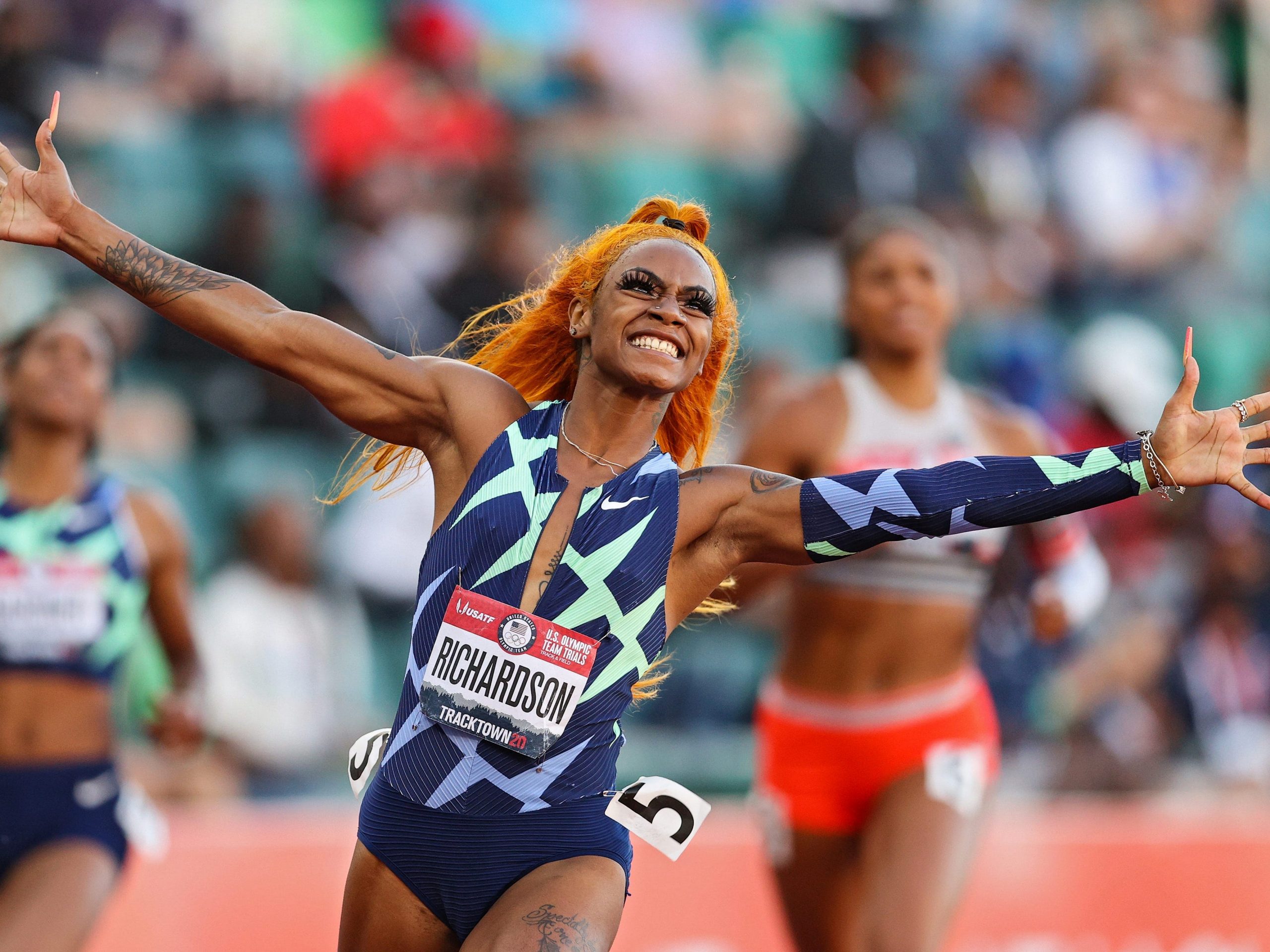 Sha'Carri Richardson celebrates winning the Women's 100 Meter final on day 2 of the 2020 U.S. Olympic Track & Field Team Trials