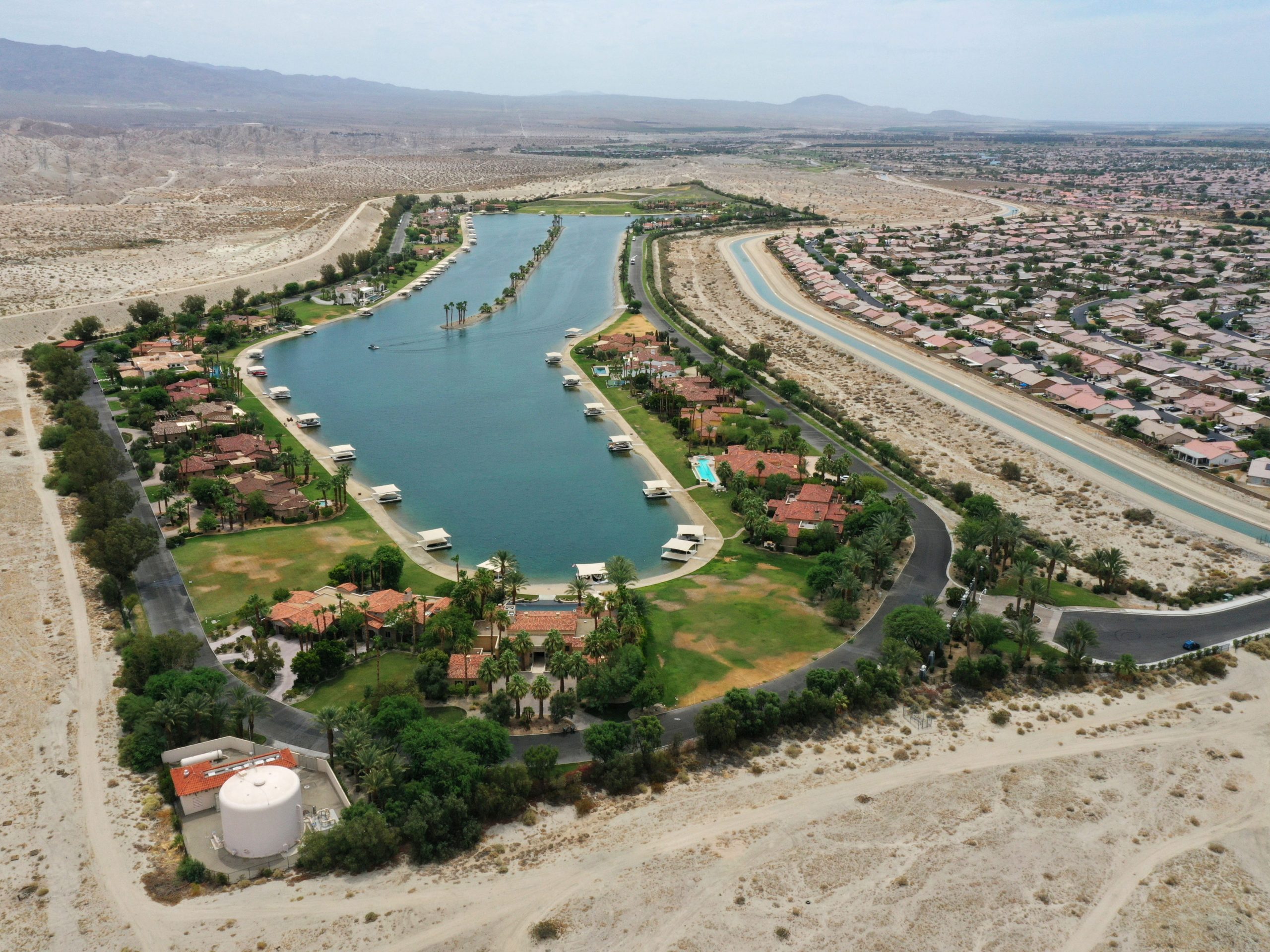 california artificial lake green lawns trees oasis in dry desert