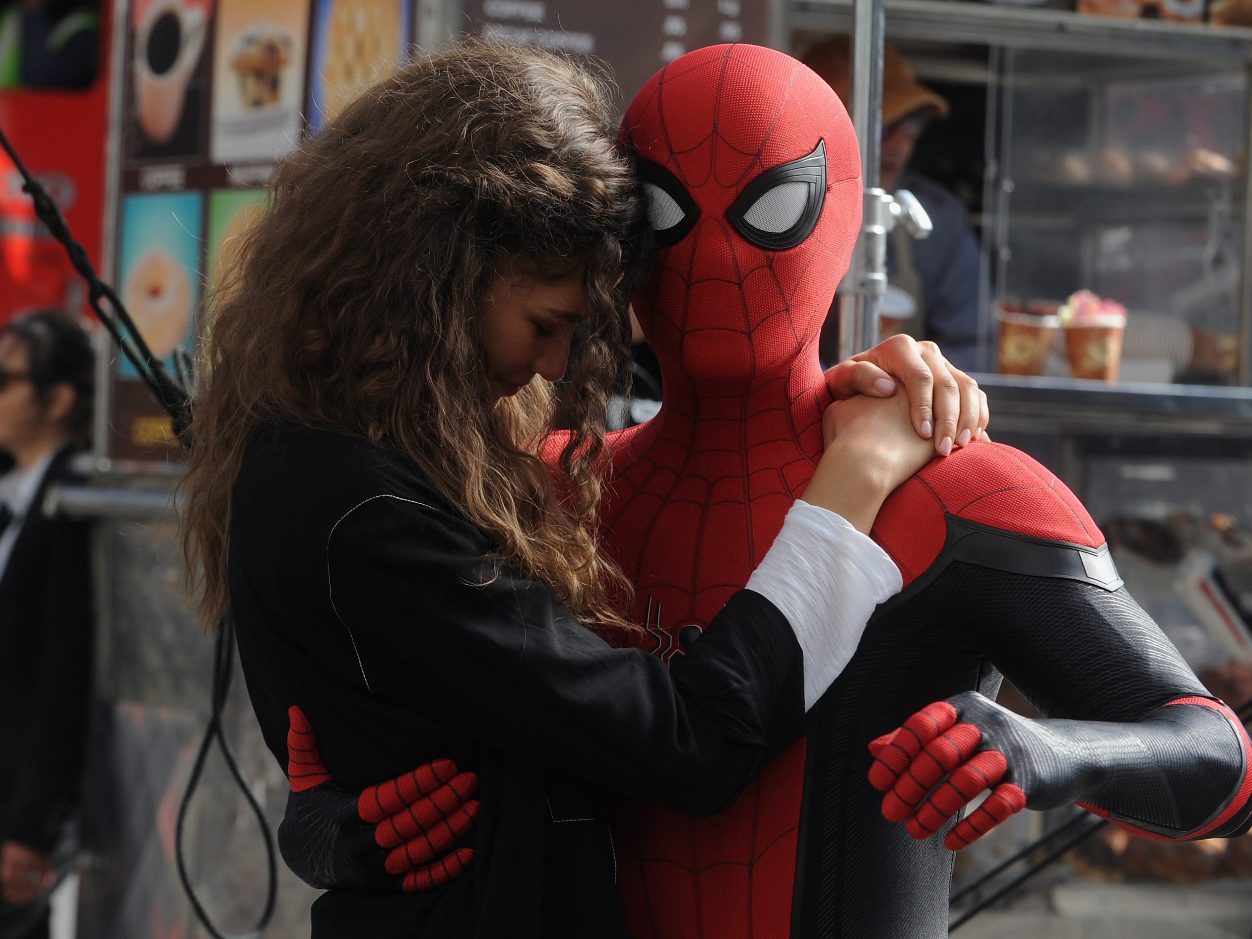 Zendaya and Tom Holland in costume as Spider-Man on the set of "Spider-Man: Far From Home" in 2018.