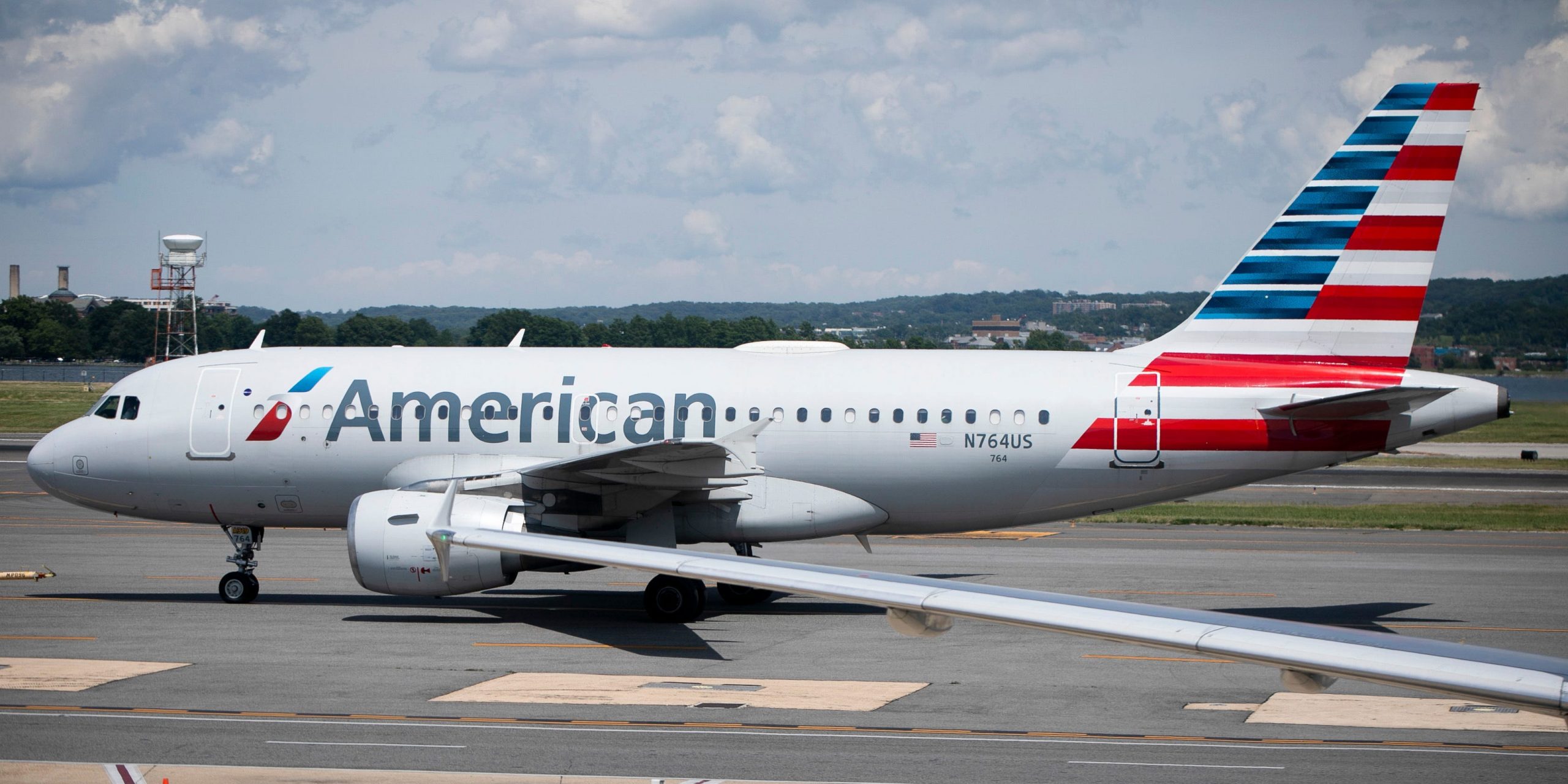 American Airlines passenger arrested after jumping from an emergency