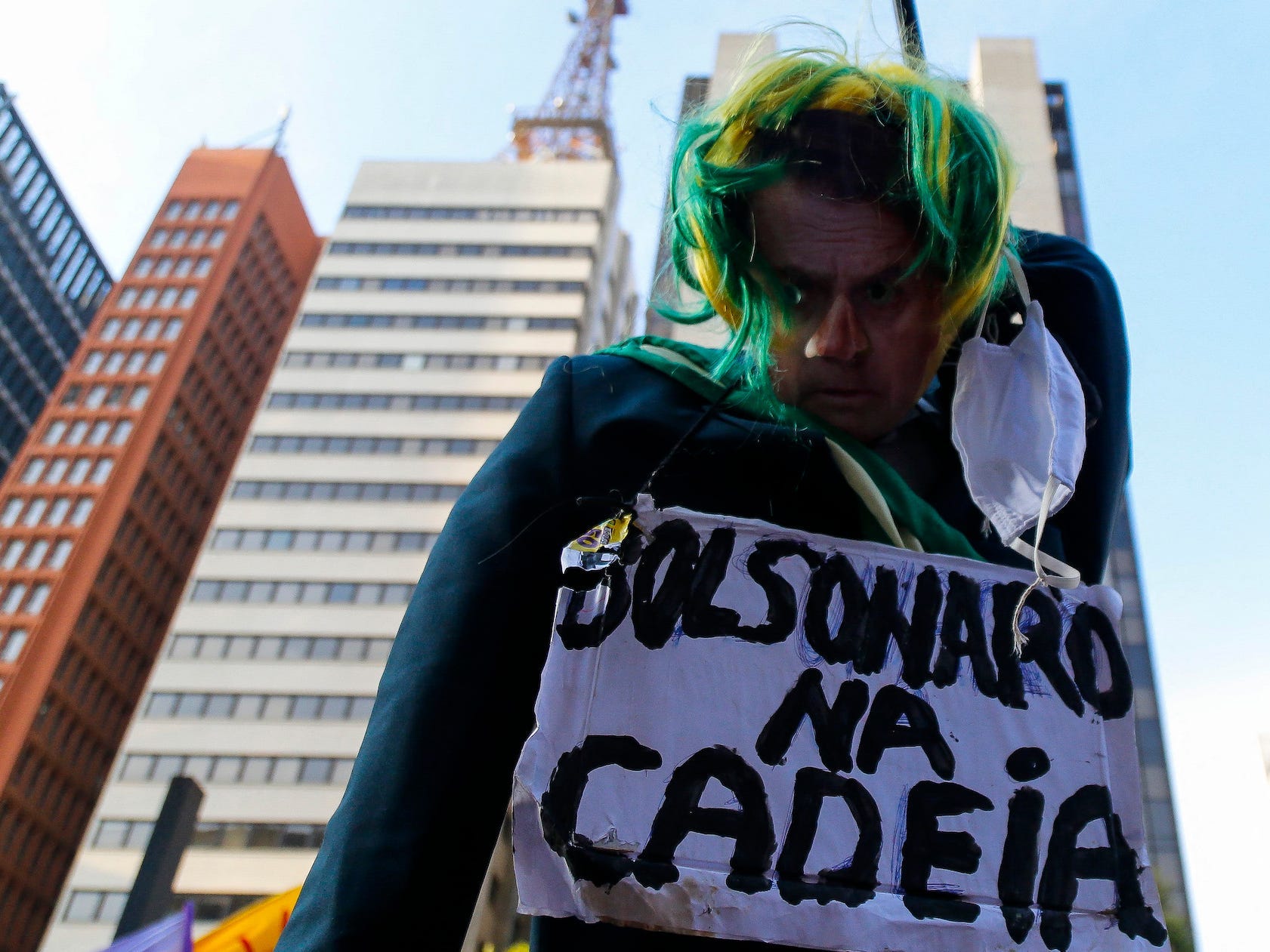 A puppet of Jair Bolsonaro with a signal that reads "Prison to Bolsonaro" is seen in a demonstration against Bolsonaro's handling of the COVID-19 pandemic in Sao Paulo, Brazil, on July 3, 2021.