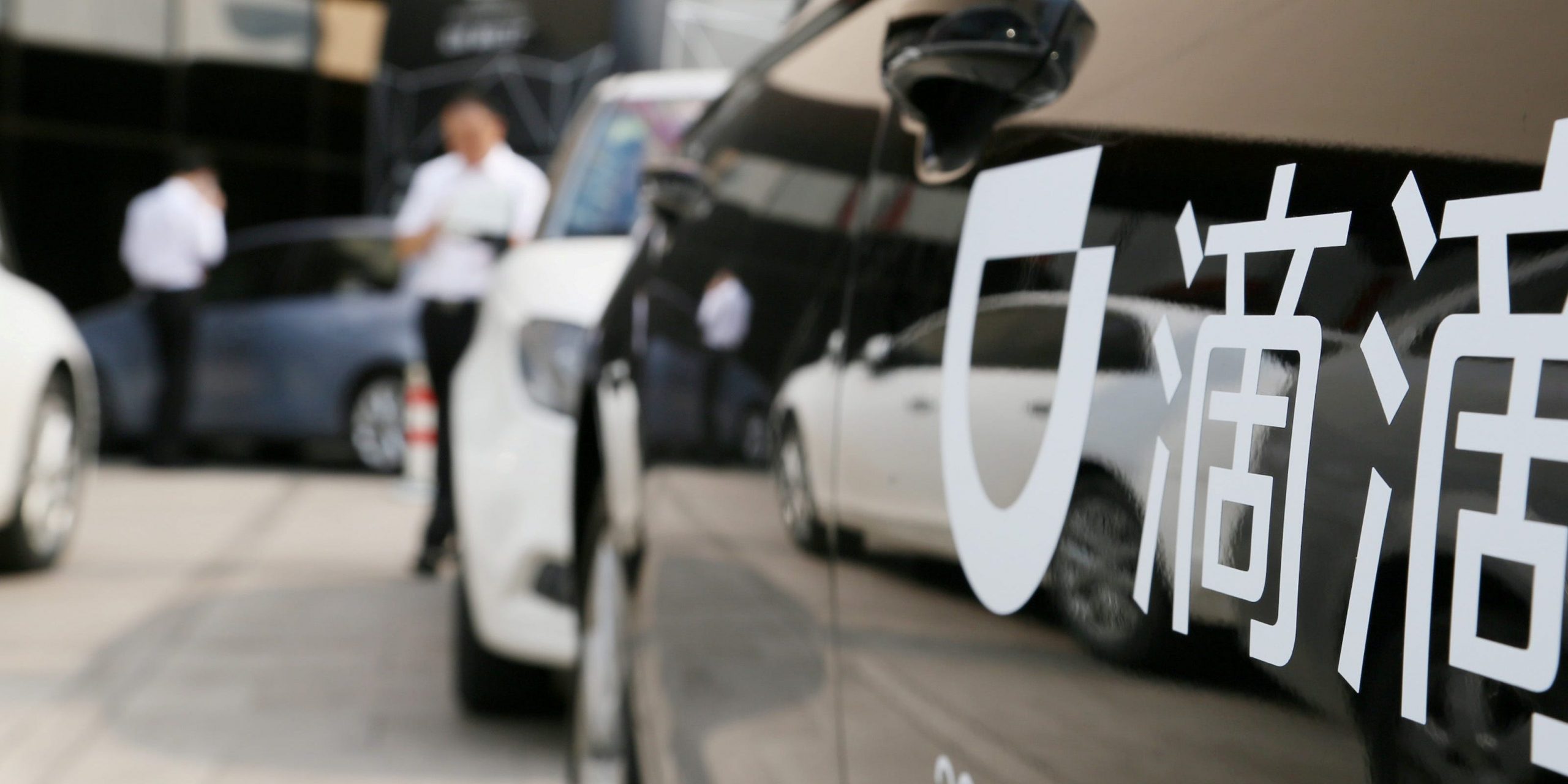 FILE PHOTO: A Didi sign is seen on a car during the China Internet Conference in Beijing, China June 21, 2016. REUTERS/Stringer/File Photo  