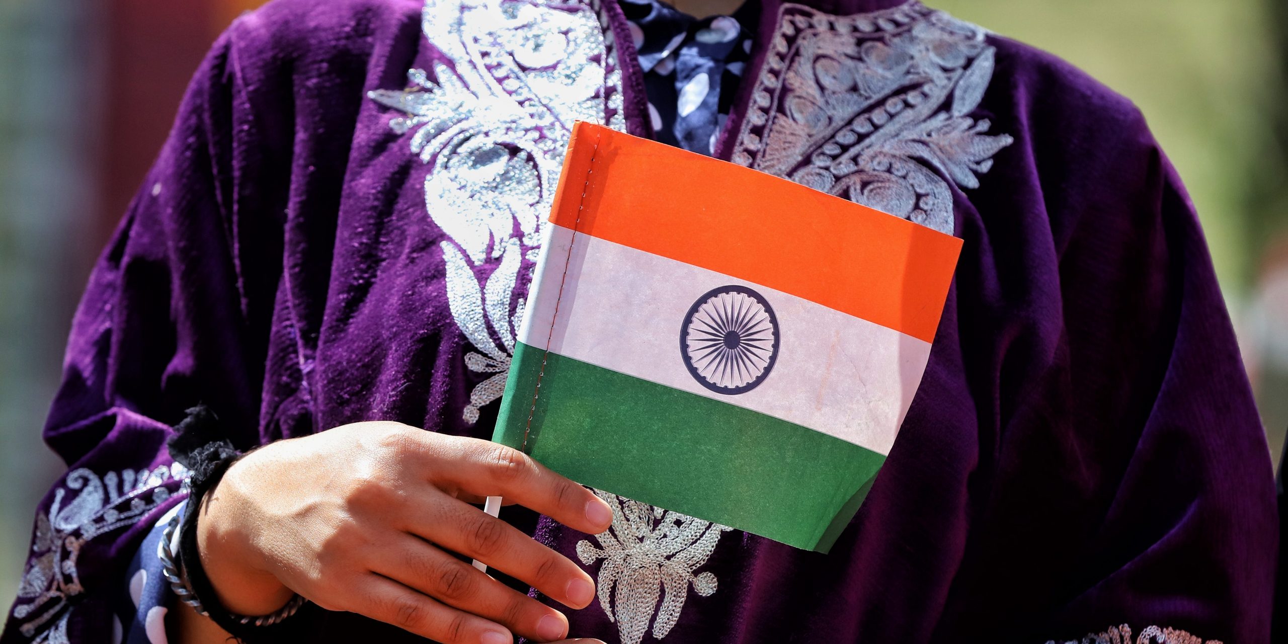 Indian flag held by a woman