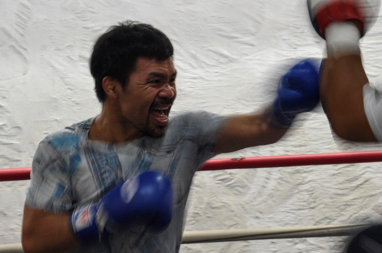 Manny Pacquiao hits the mitts during a recent training session.