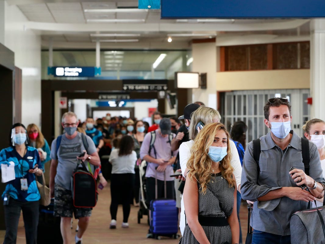 Visitors at the Daniel K. Inouye International Airport in Honolulu, Hawaii, enter the state after the new pre-travel testing program launched.