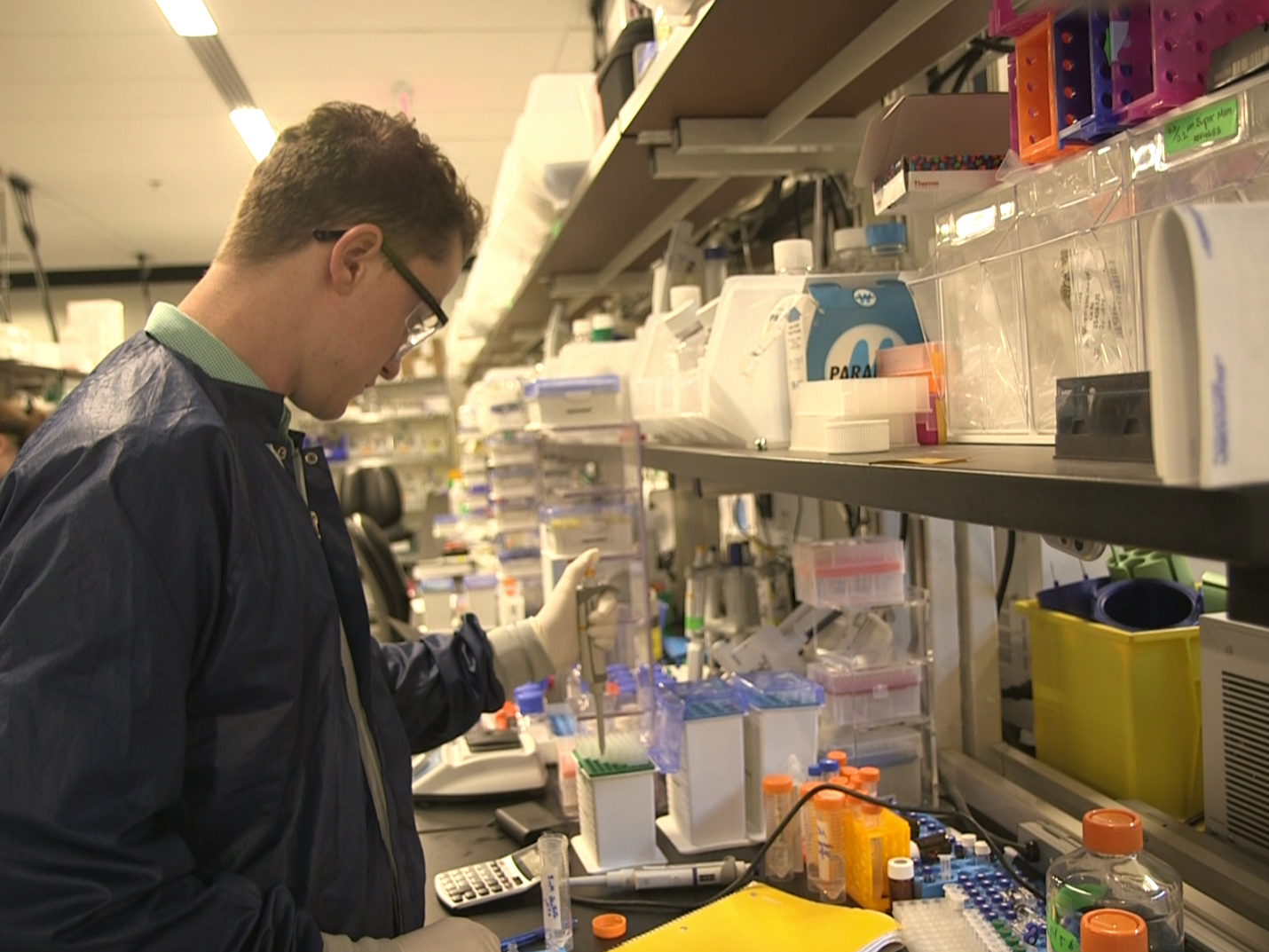 A scientist at Moderna works on research at the biotech's R&D hub in Norwood, Massachusetts