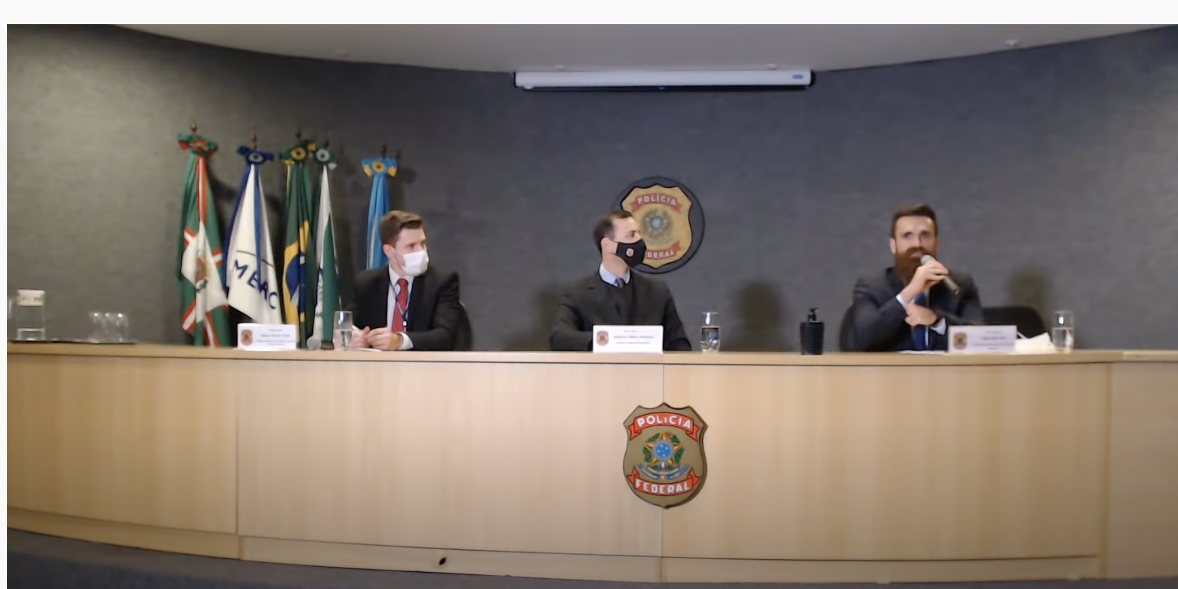 Police in Brazil hold a press conference about an investigation into a bitcoin scam.