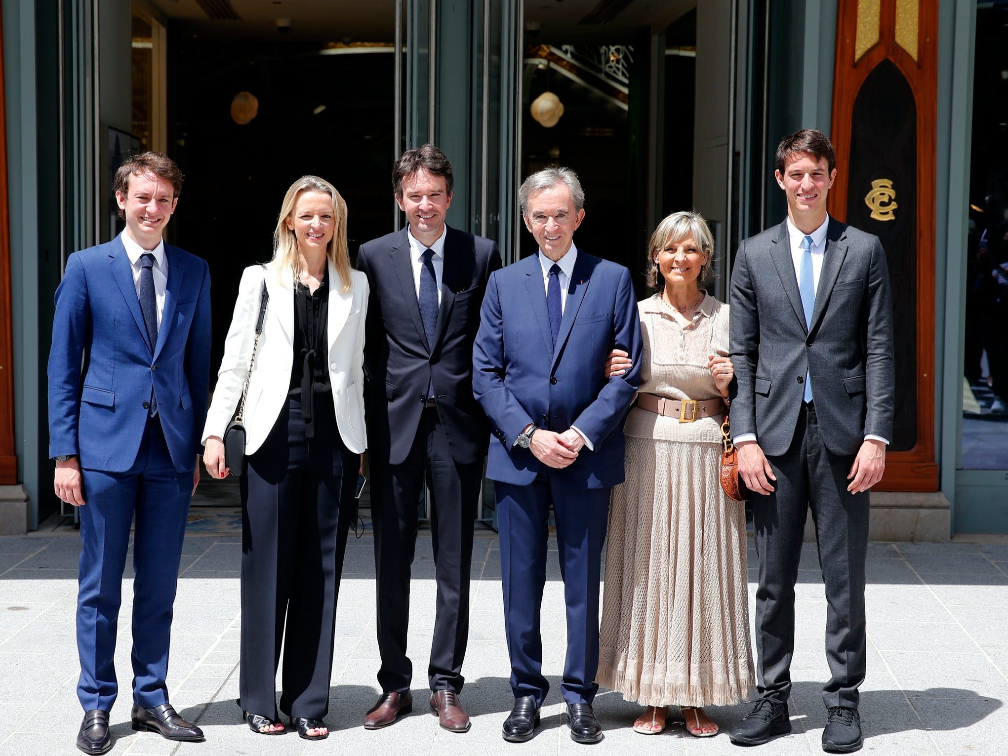 arnault family poses in front of samaritaine department store in paris june 2021