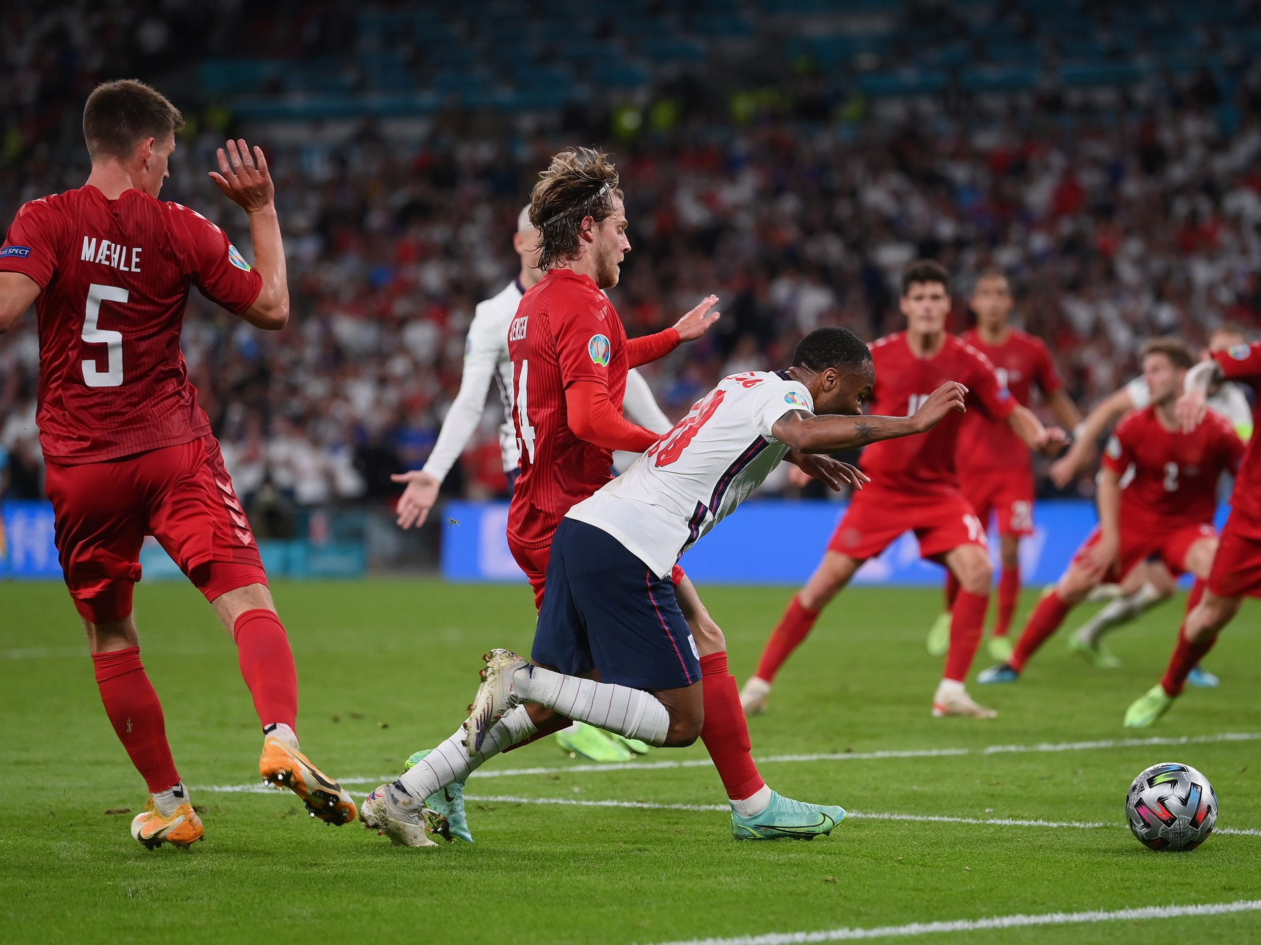 Raheem Sterling is fouled by Mathias Jensenduring the UEFA Euro 2020 Championship Semi-final match between England and Denmark