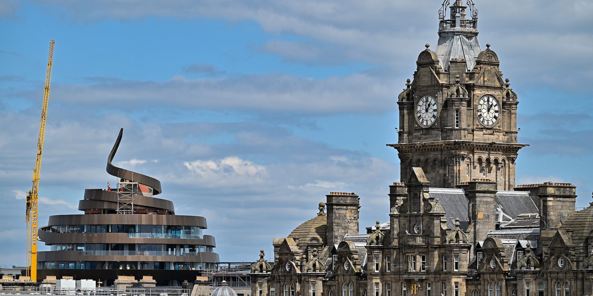 A view of Edinburgh's skyline showing the Ribbon Hotel and a sandstone building more typical of the city's skyline