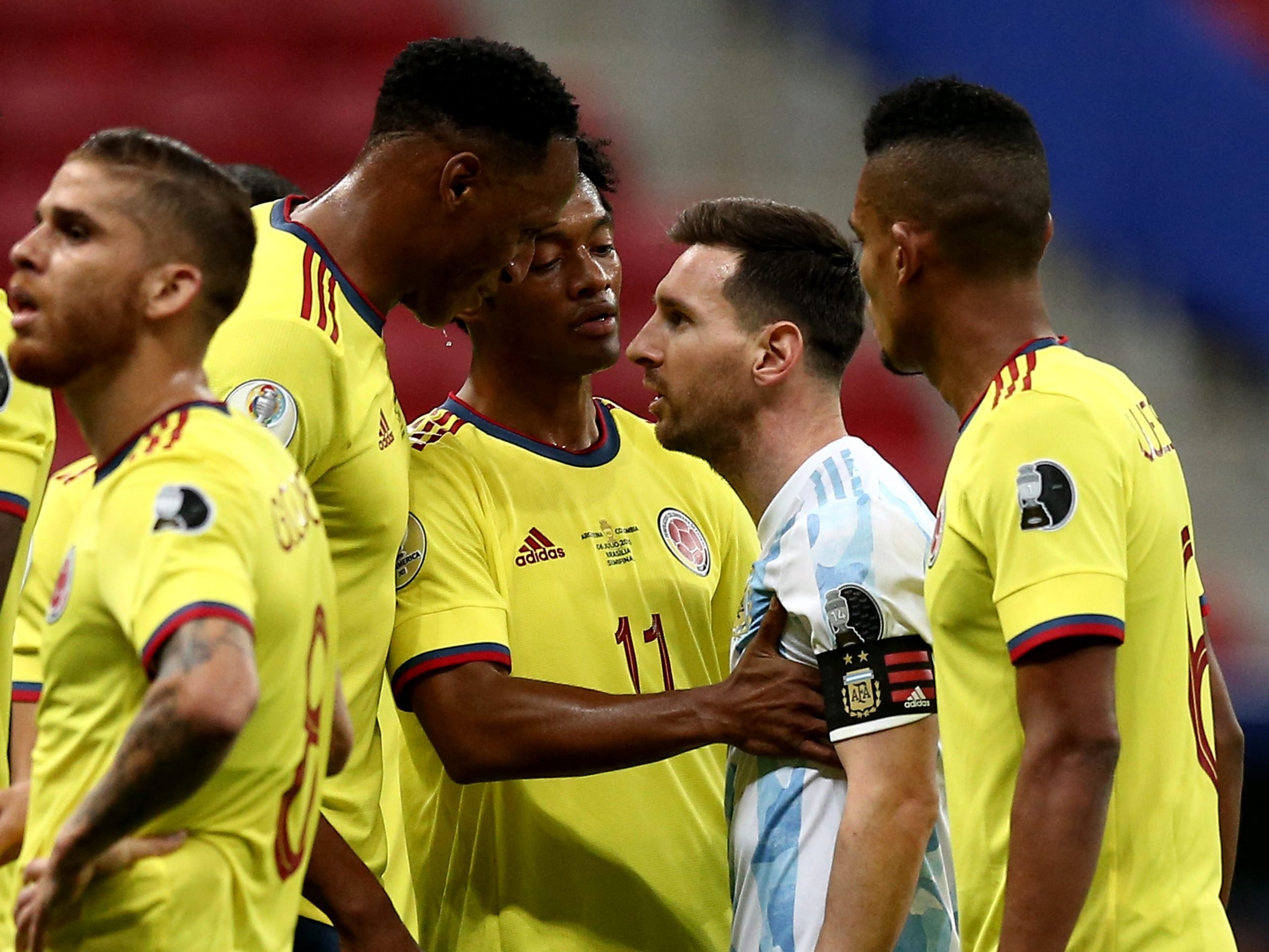 Lionel Messi argues with Colombia's Yerry Mina during the Copa América