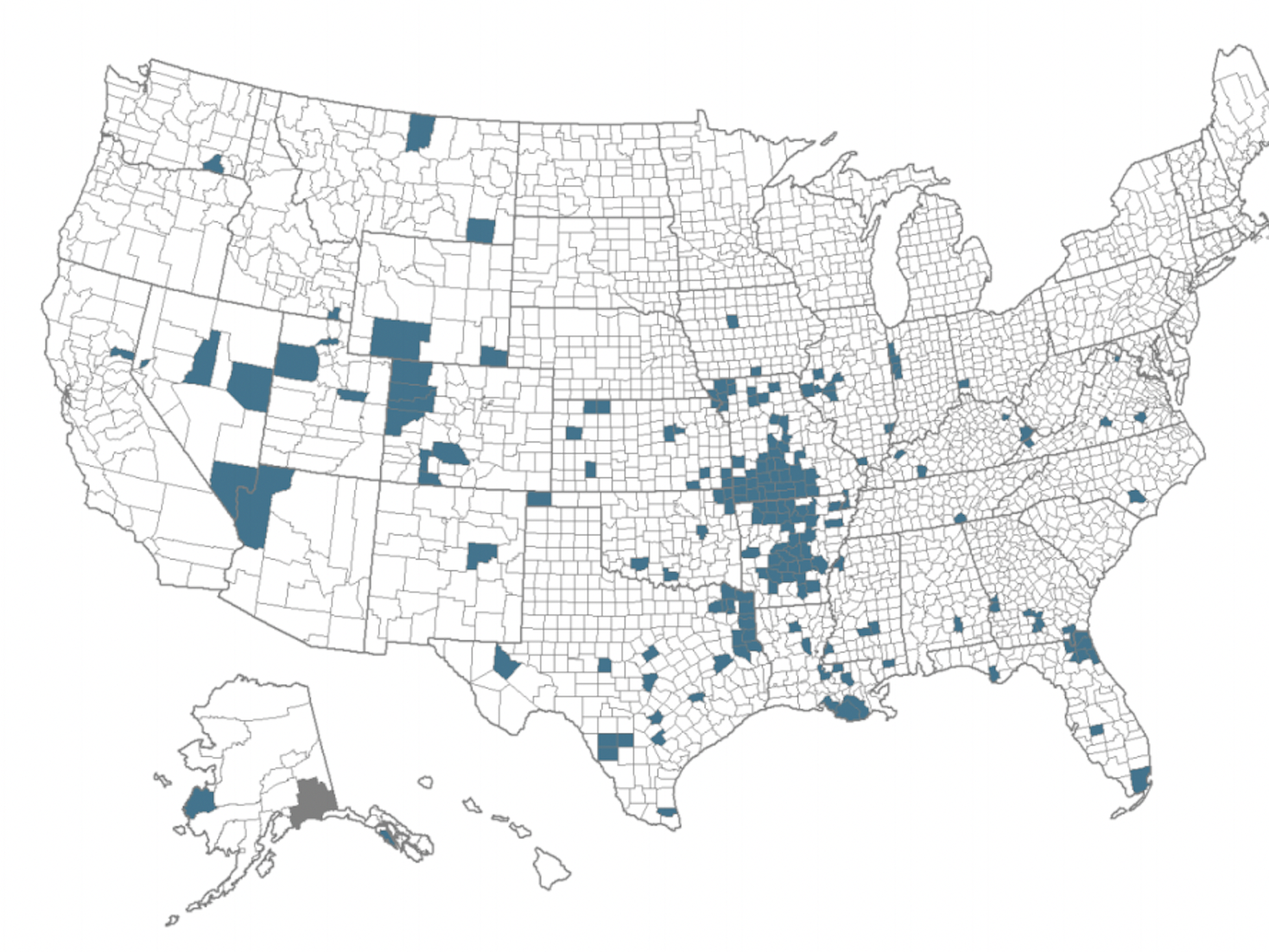 A map shows states in the US where cases of COVID-19 have risen above 100 per 100,000.