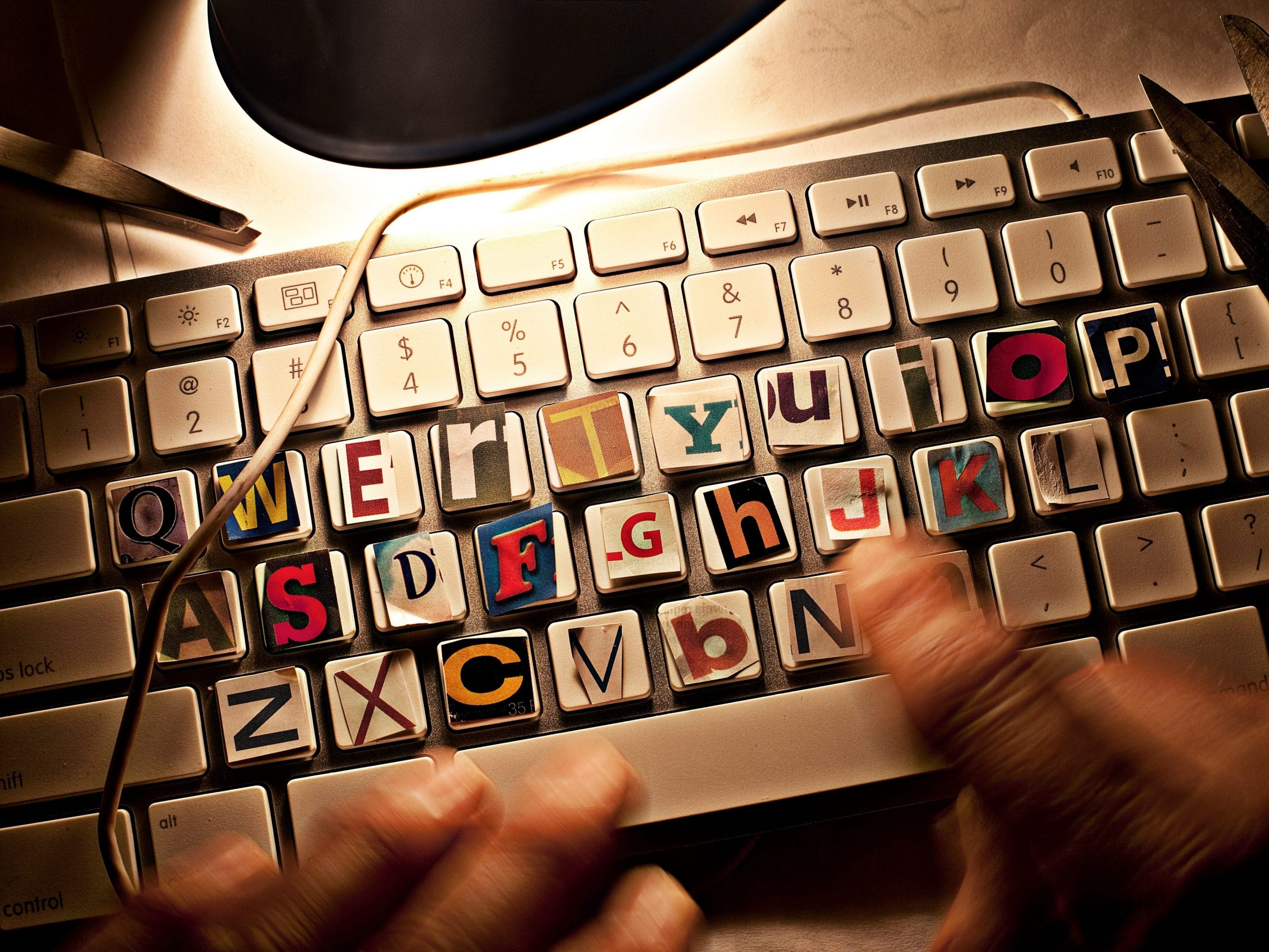 Keyboard replaced with ransom-style letters.