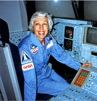 Aviator Wally Funk behind a control panel