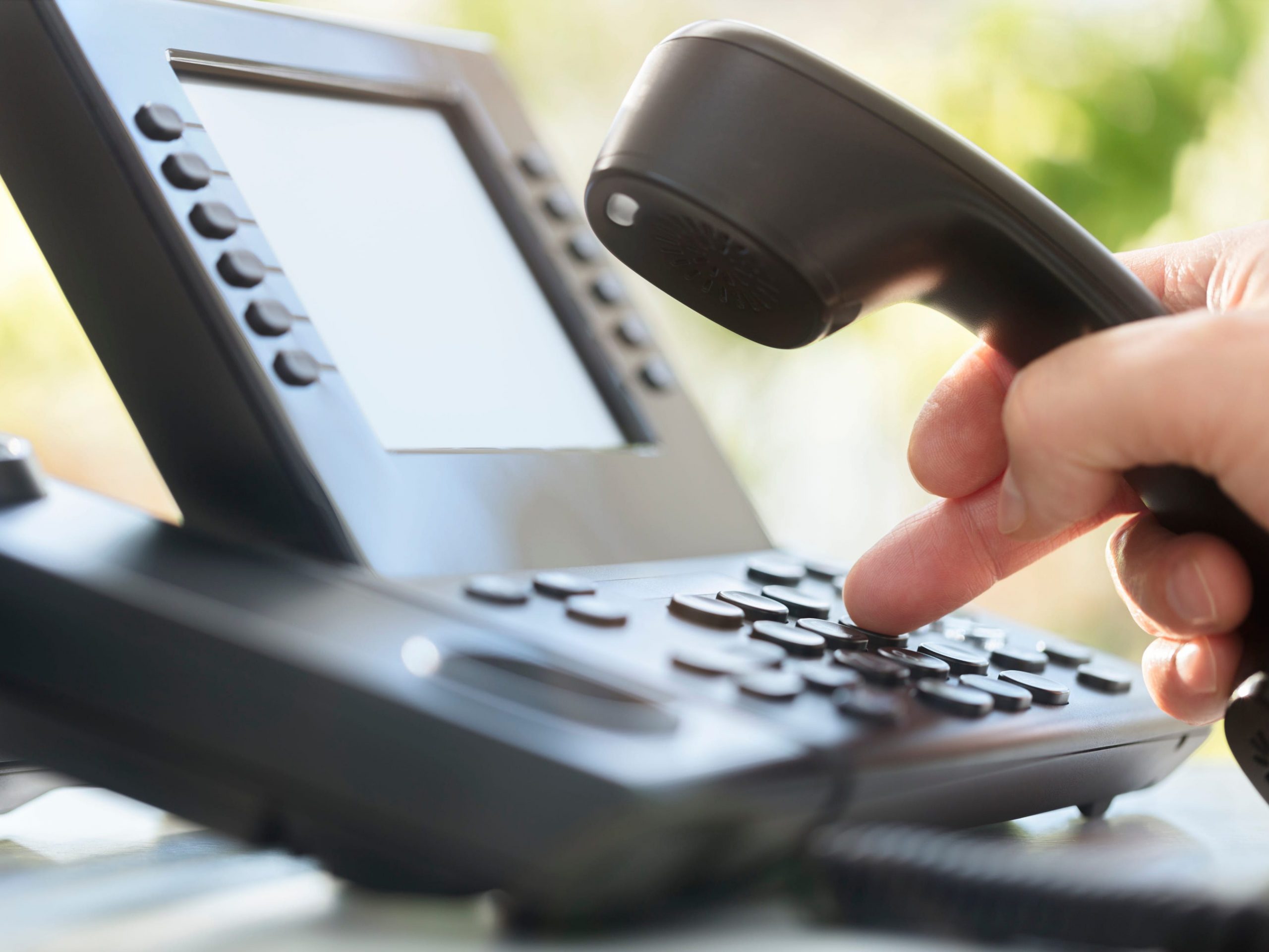 Stock photo of a phone at a call center