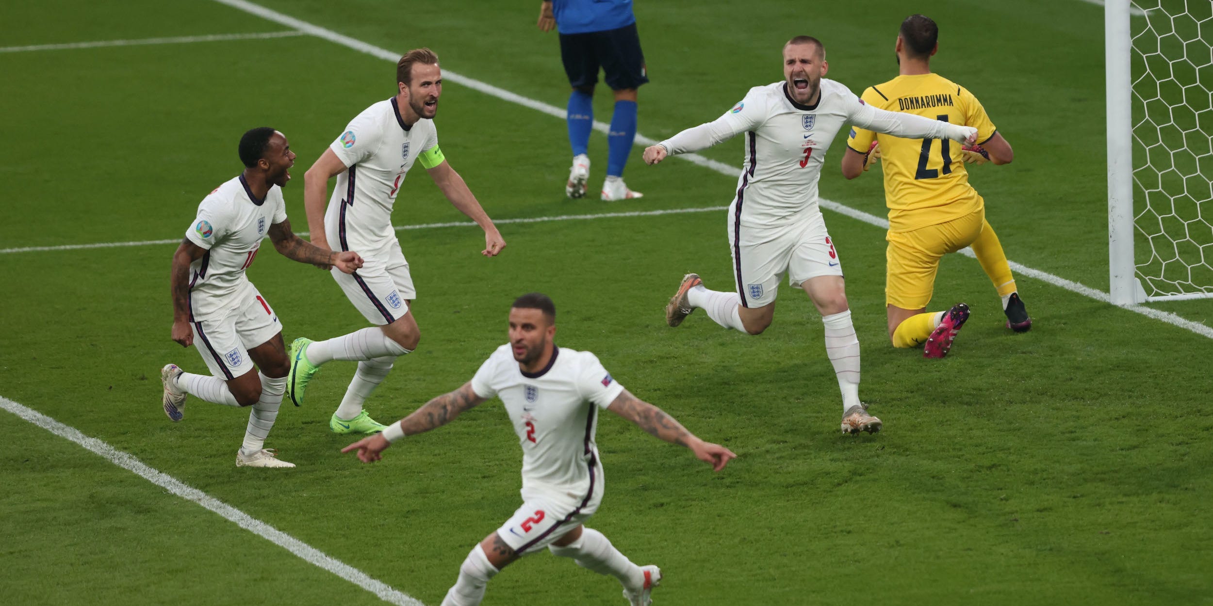 England's Luke Shaw celebrates scoring the opening goal during the final of Euro 2020.