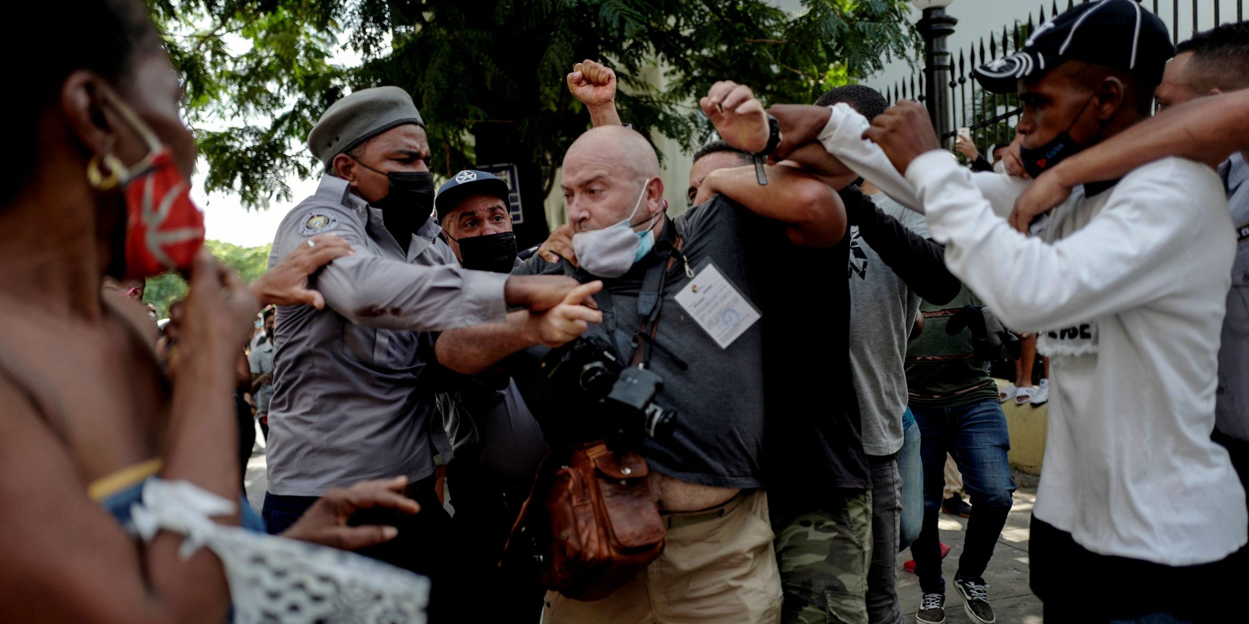 AP photographer, Spanish Ramon Espinosa, is attacked by the police while covering a demonstration against Cuban President Miguel Diaz-Canel in Havana, on July 11, 2021.