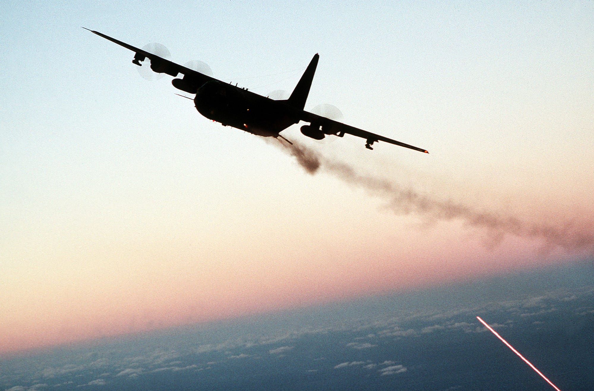 AC-130 firing cannons