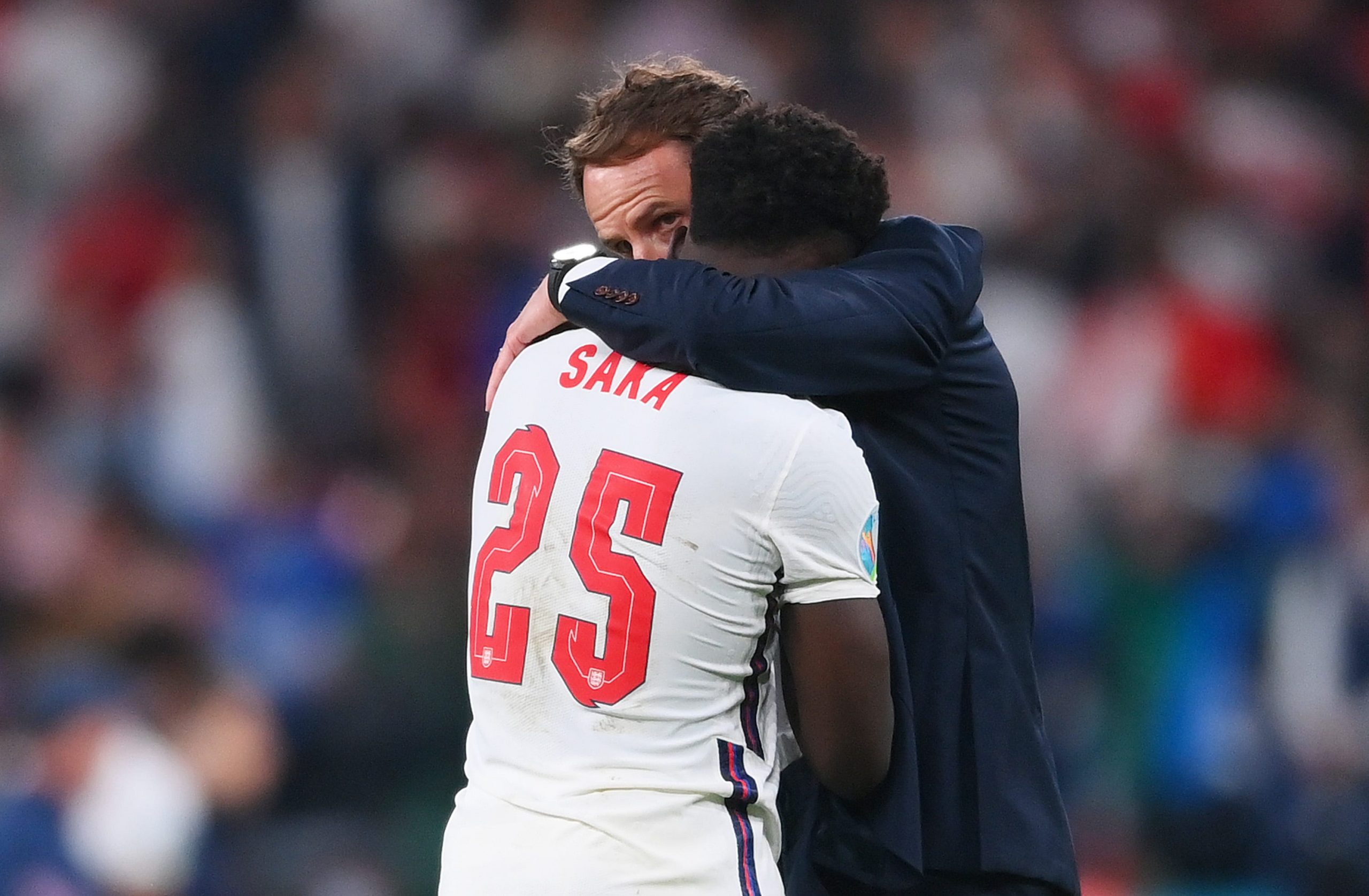 Gareth Southgate consoles Bukayo Saka after England is defeated in the Euro 2020 final