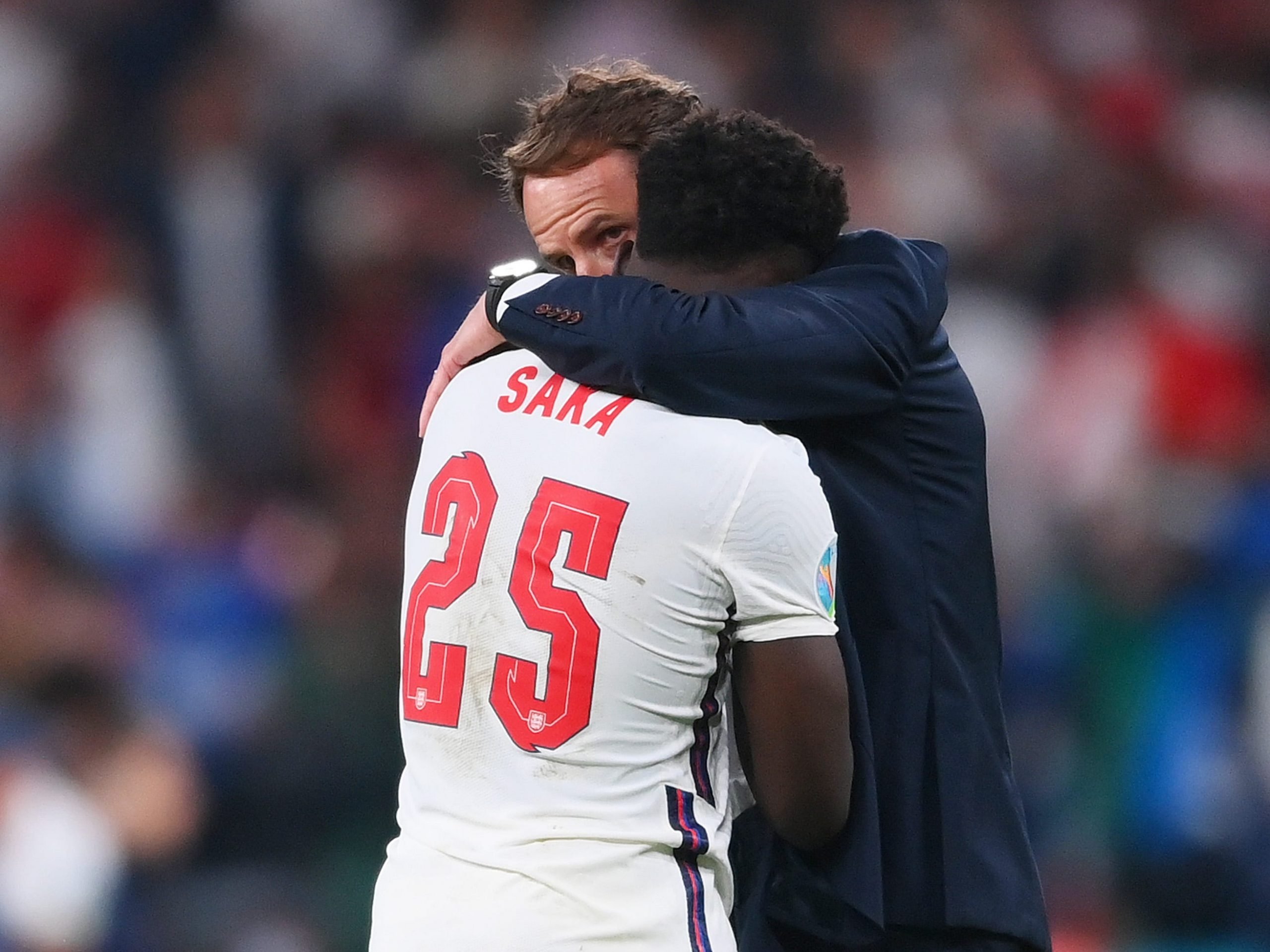 Gareth Southgate consoles Bukayo Saka after England is defeated in the Euro 2020 final