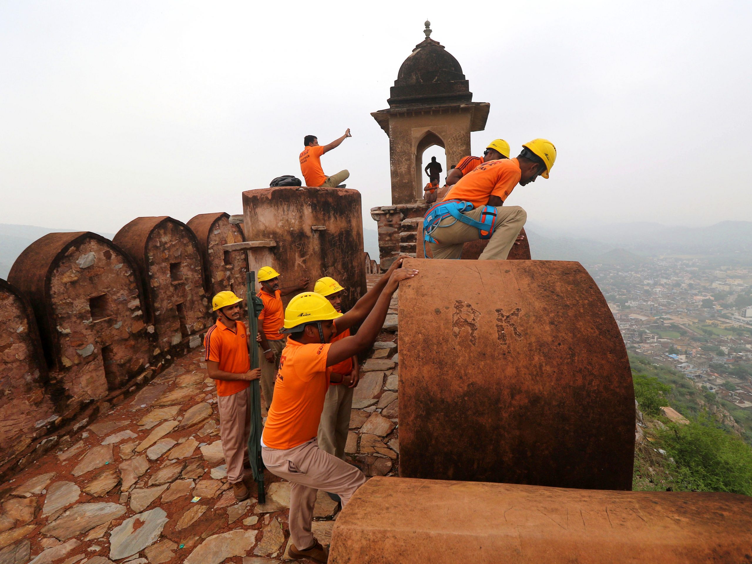 State Disaster Response personnel perform a search operation at a watchtower of the 12th century Amber Fort where 11 people were killed Sunday after being struck by lightning in Jaipur, Rajasthan state, India