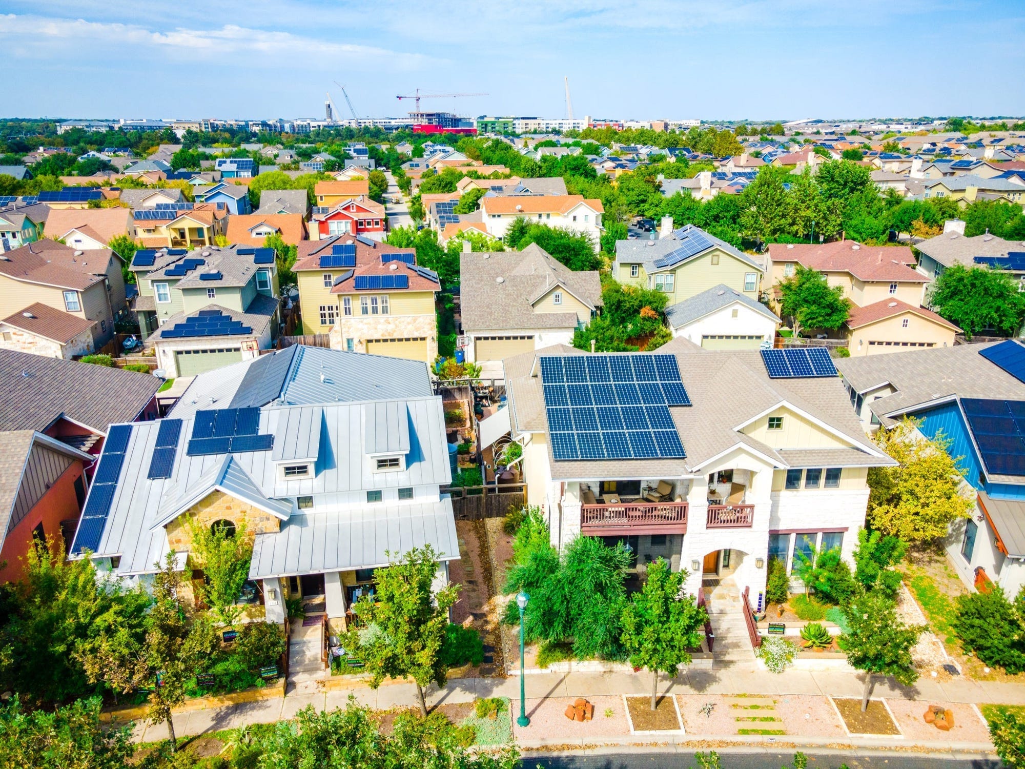 Rows of single-family homes in a suburban neighborhood.