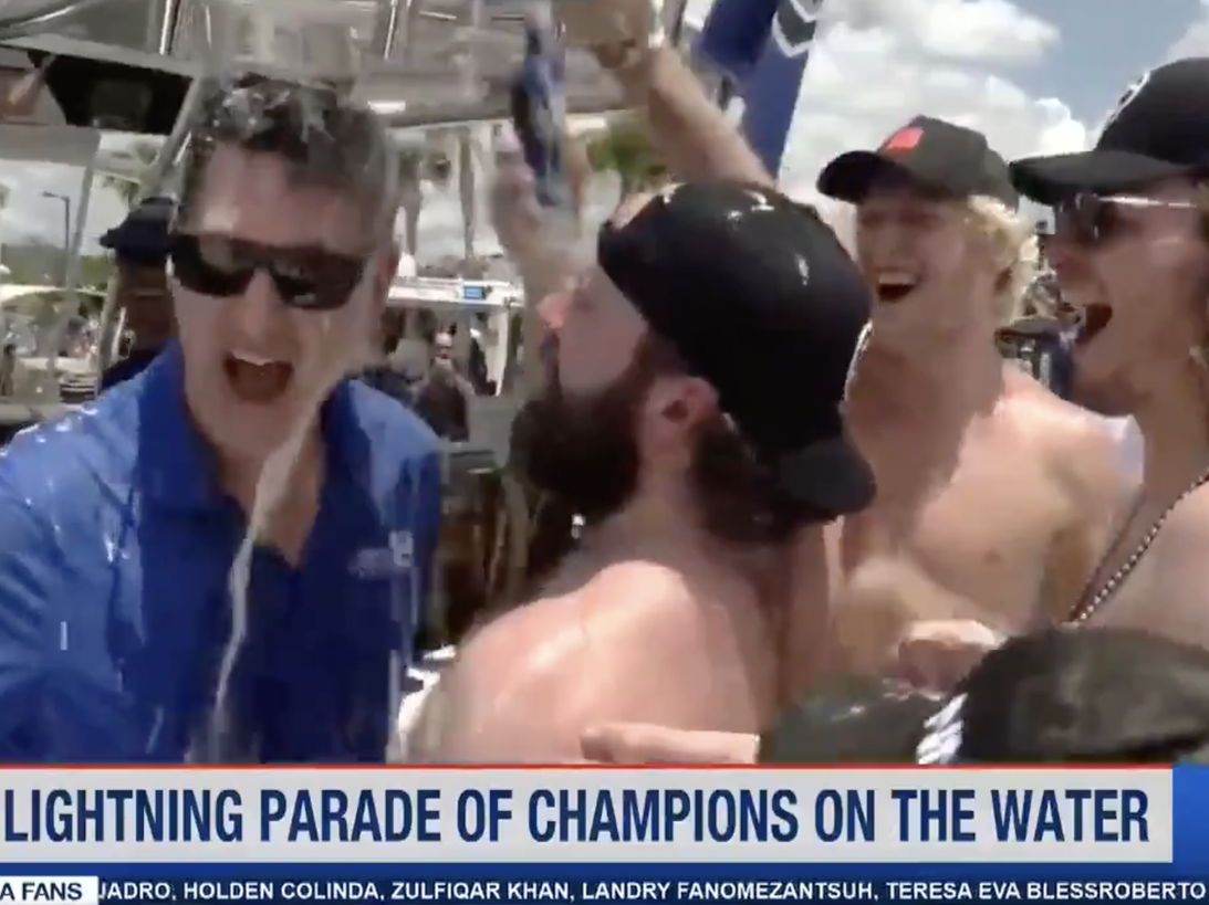 A still image from a video showing Tampa Bay Lightning right winger Nikita Kucherov dumping his drink on a WFLA.com reporter’s head while was interviewed at a boat parade.