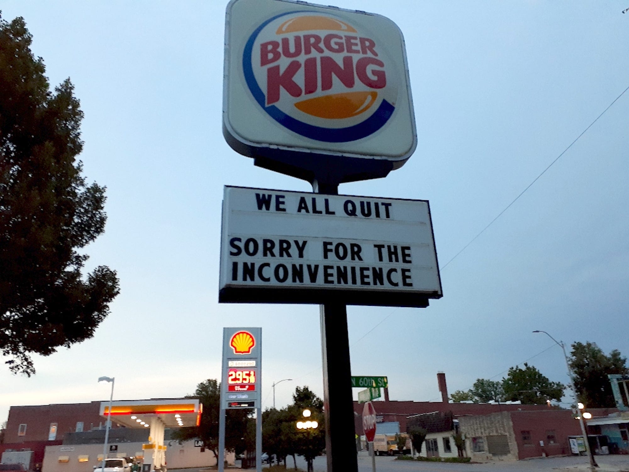 A sign reads "we all quit" at a Burger King in Nebraska