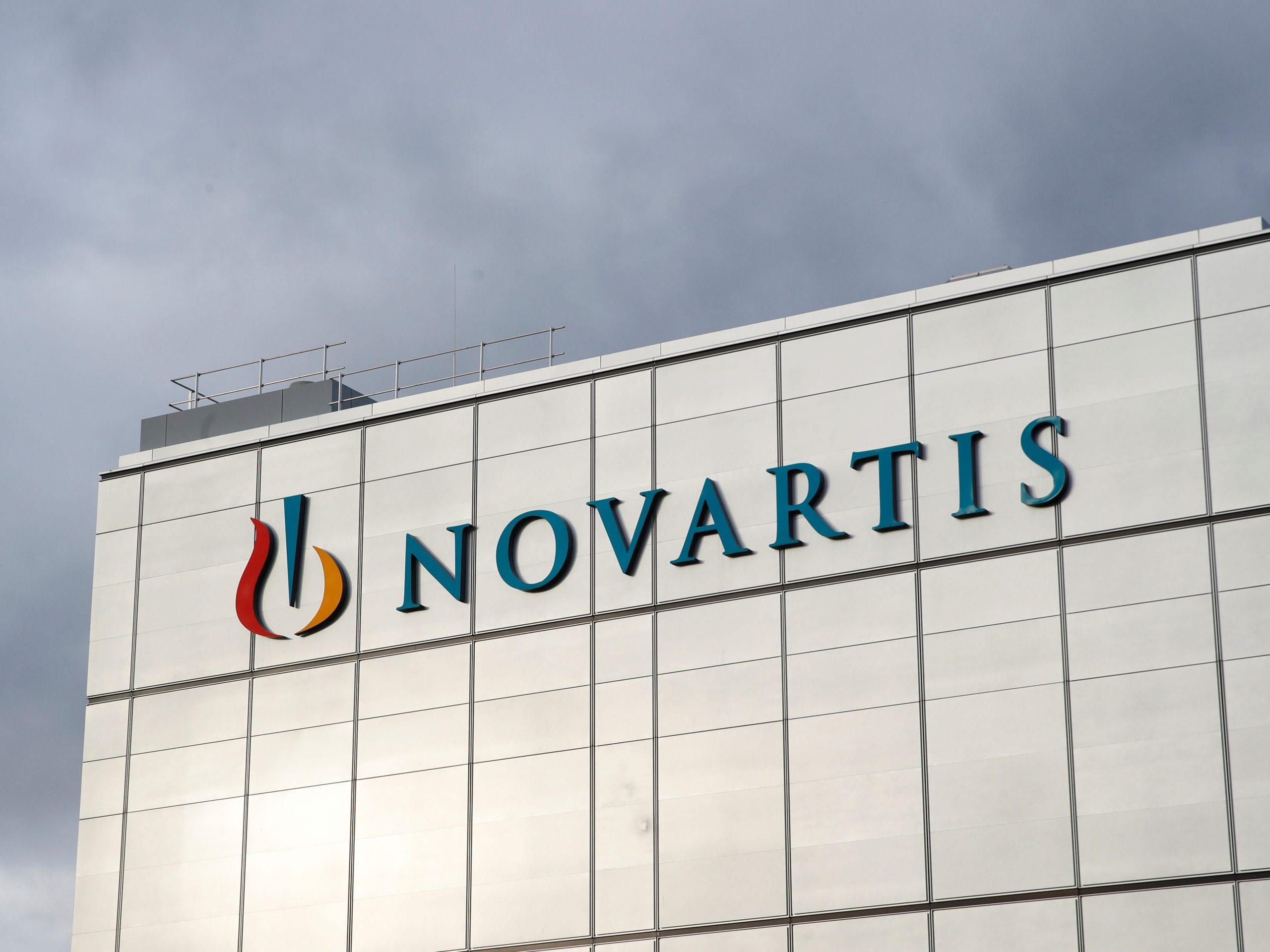 FILE PHOTO: The company's logo is seen at the new cell and gene therapy factory of Swiss drugmaker Novartis in Stein, Switzerland, November 28, 2019. REUTERS/Arnd Wiegmann