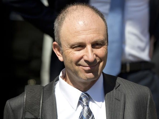 Pfizer worldwide research and development president Mikael Dolsten leaves after appearing at a commons science committee hearing at Portcullis House in London May 14, 2014.  REUTERS/Neil Hall 