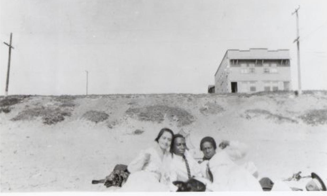 Black and white photo shows residents at Bruce's Beach.