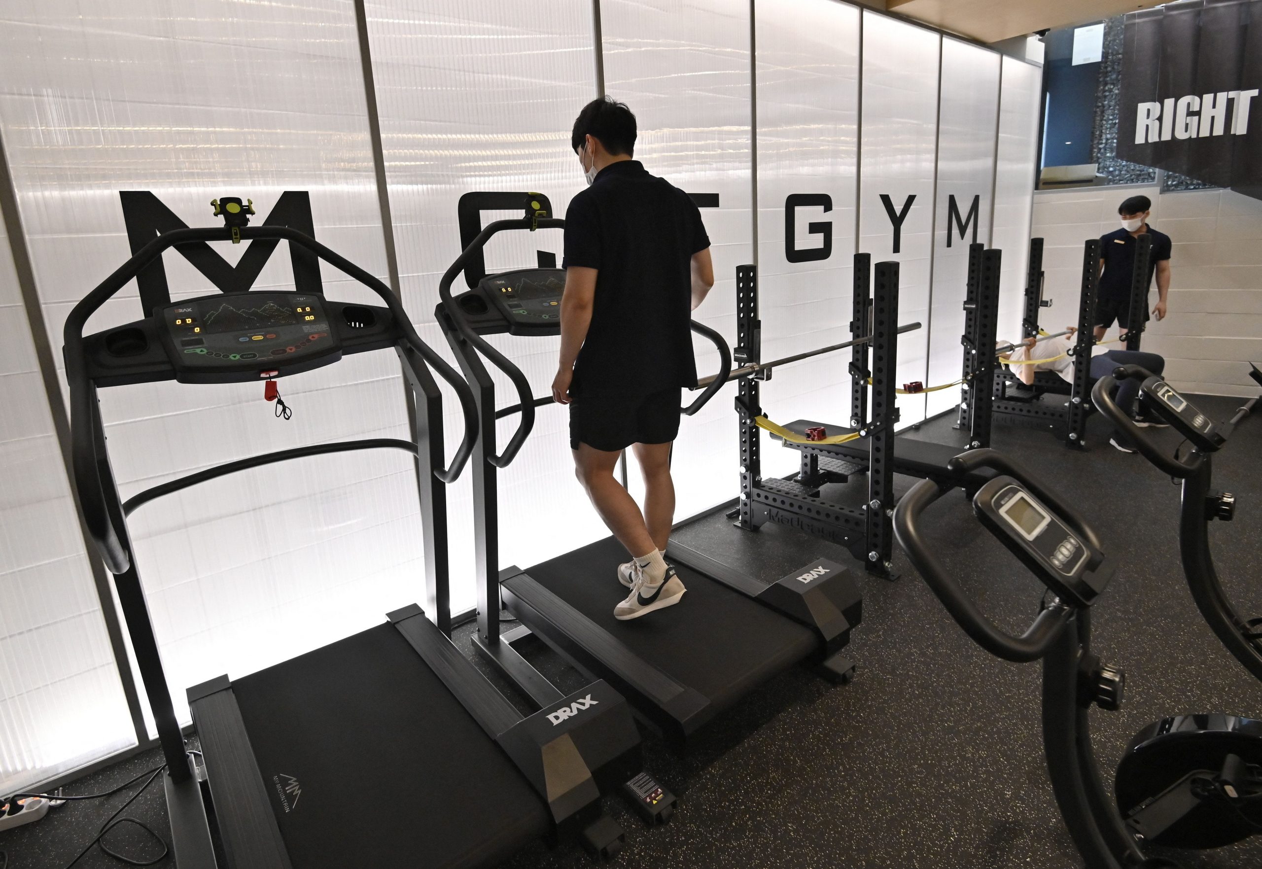 man on treadmill in South Korean gym