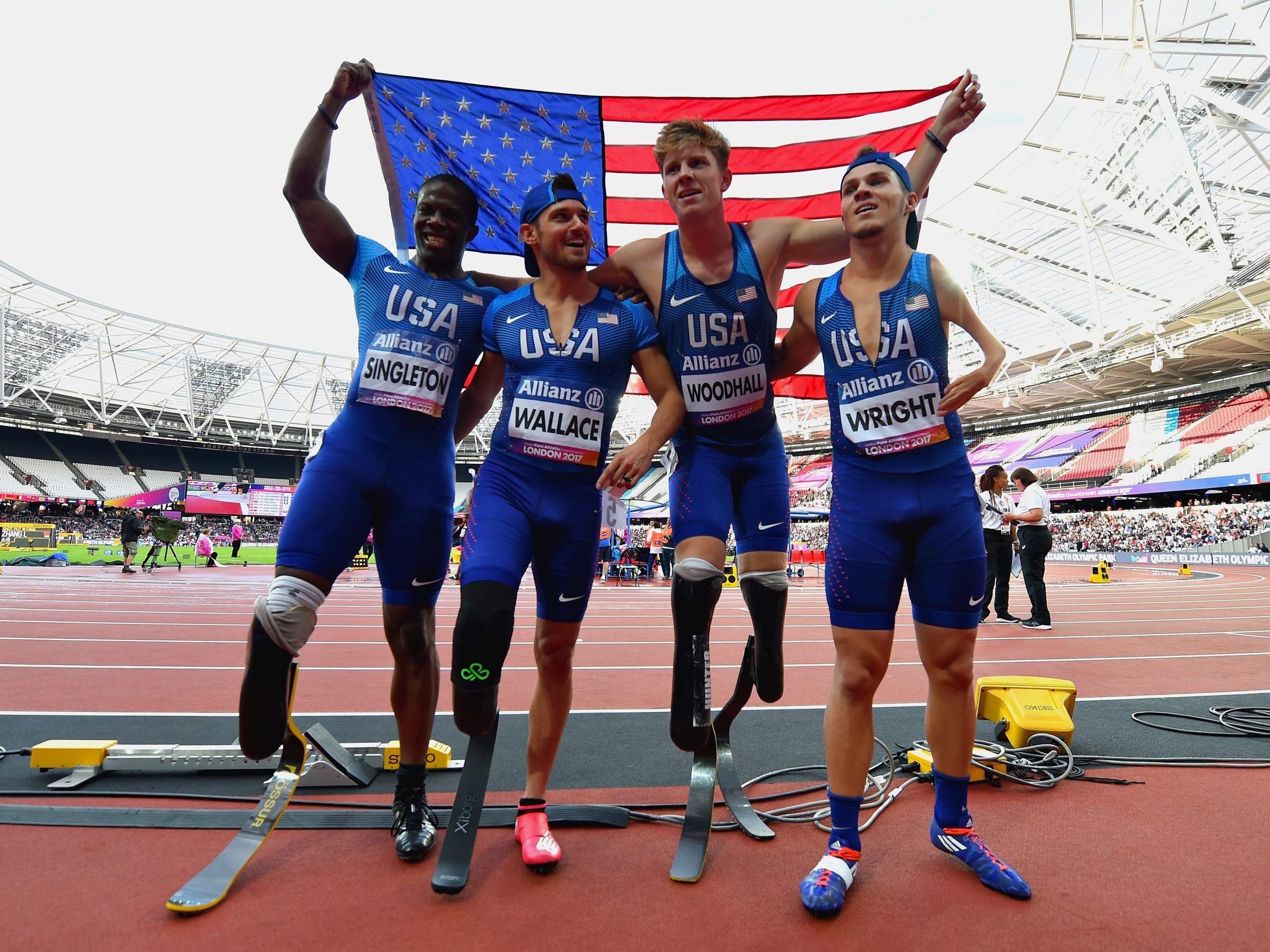 Hunter Woodhall stands next to his USA teammates at the IPC World ParaAthletics Championships in 2017.