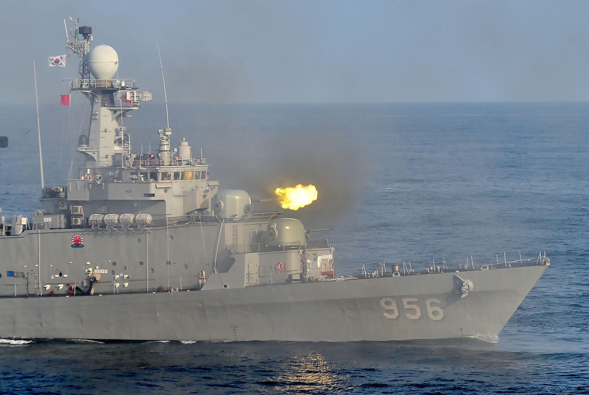 South Korean navy frigate firing weapons