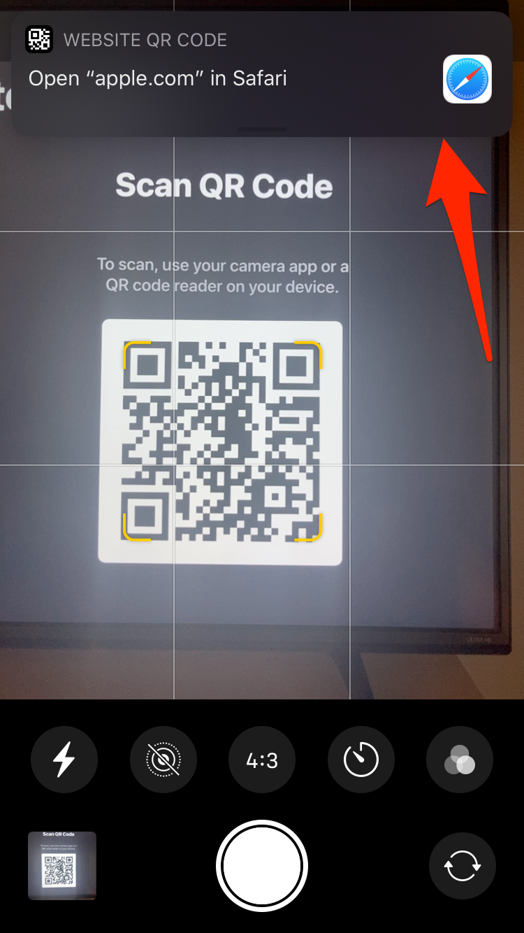 Scanning a QR code using an iPhone camera.