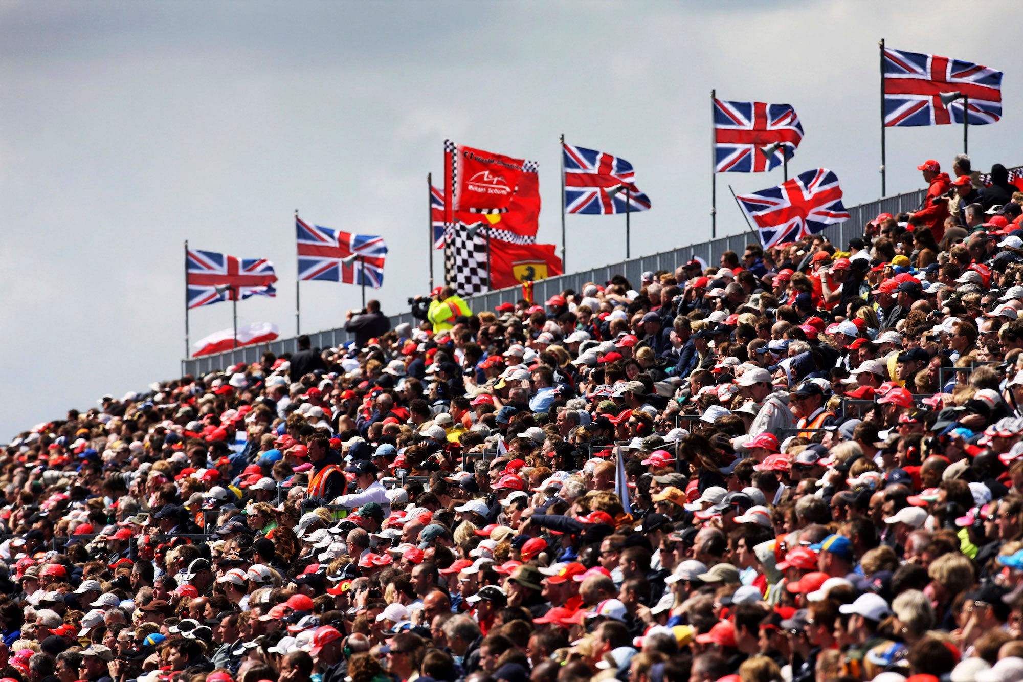 Formula One spectators and fans make up the crowd at the 2008 British Grand Prix at Silverstone Circuit, England, on the 06 July 2008