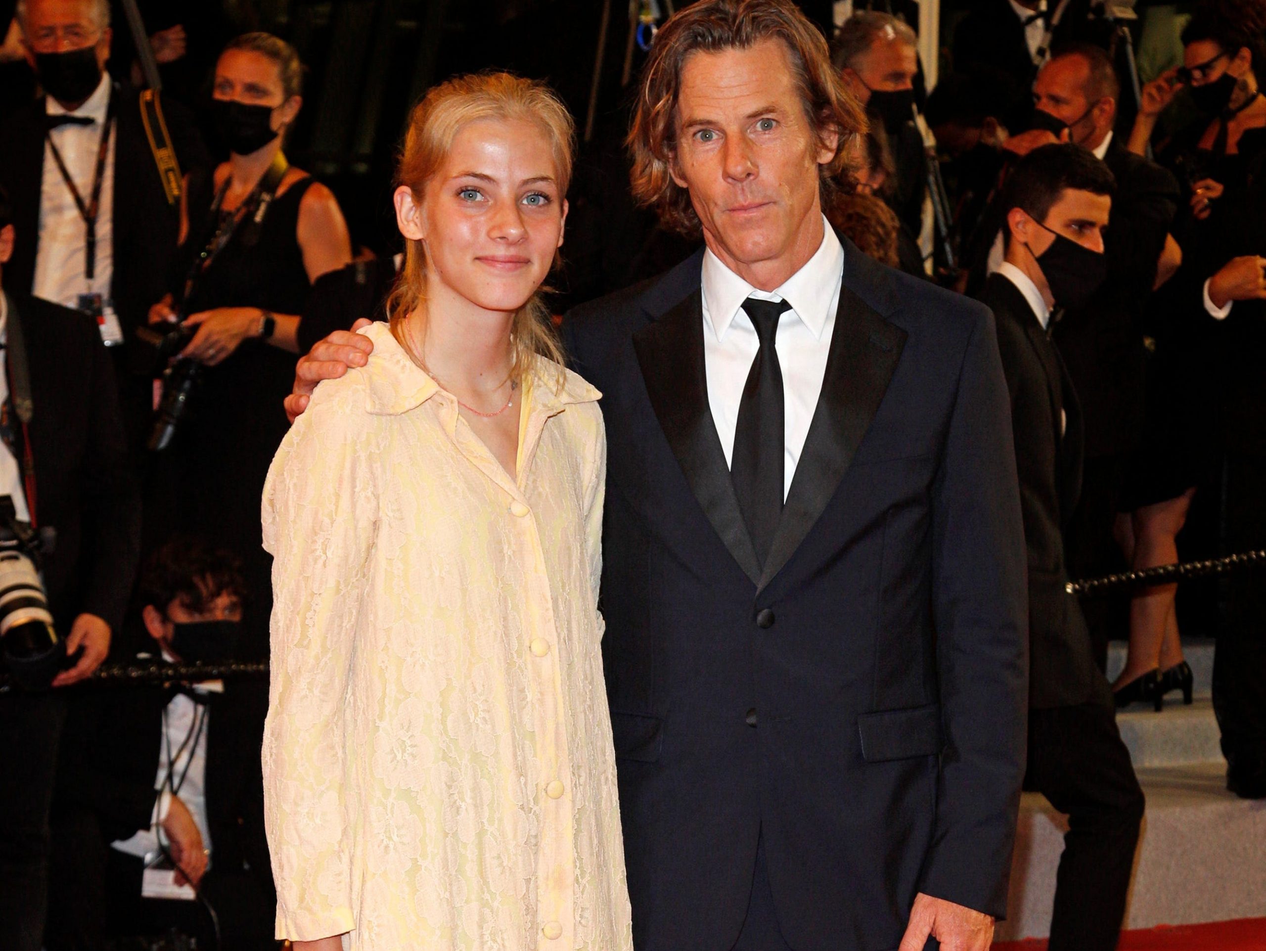 Hazel Moder poses with father Daniel Moder on the red carpet at the Cannes Film Festival.