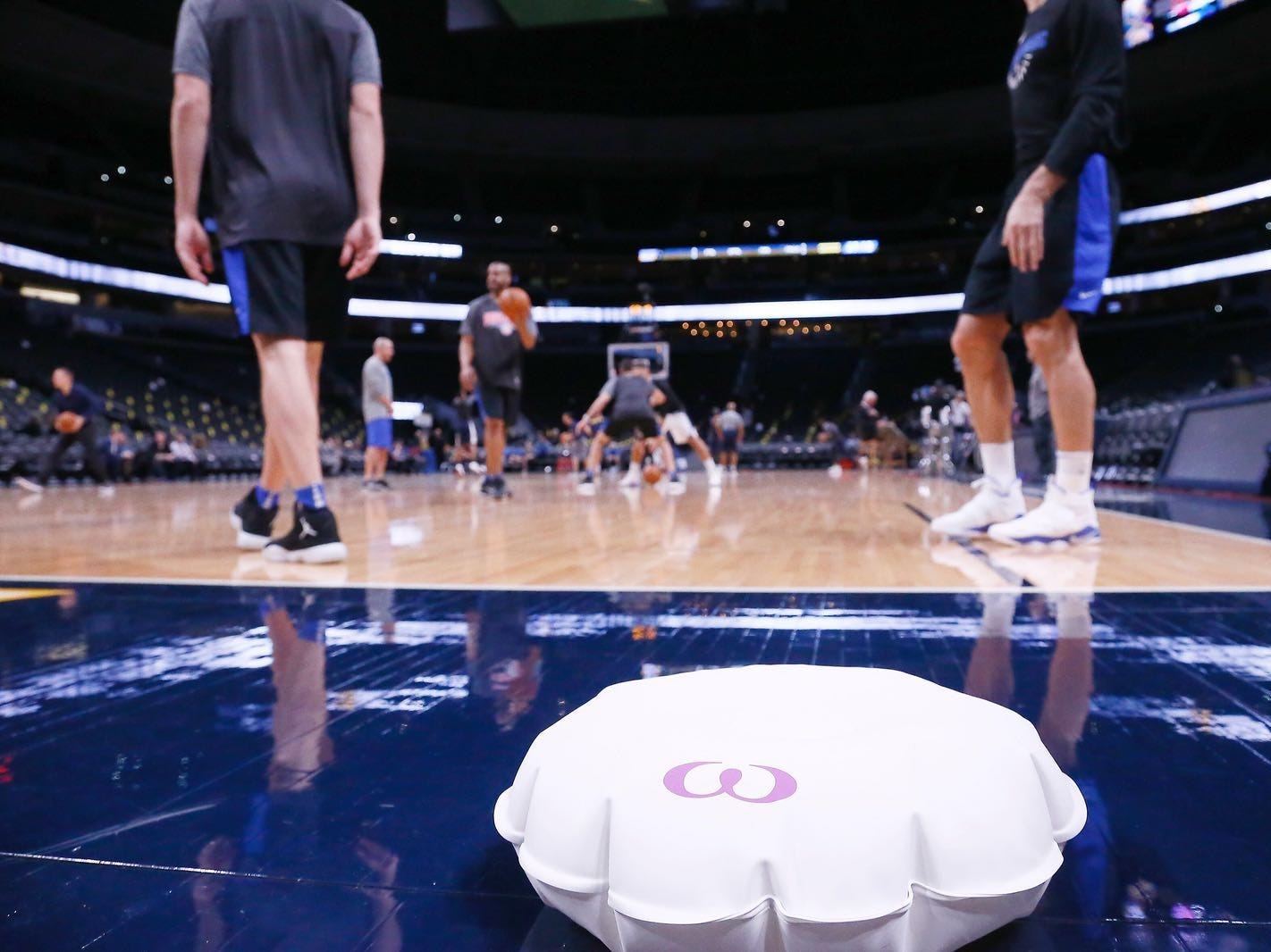 Waff courtside.
