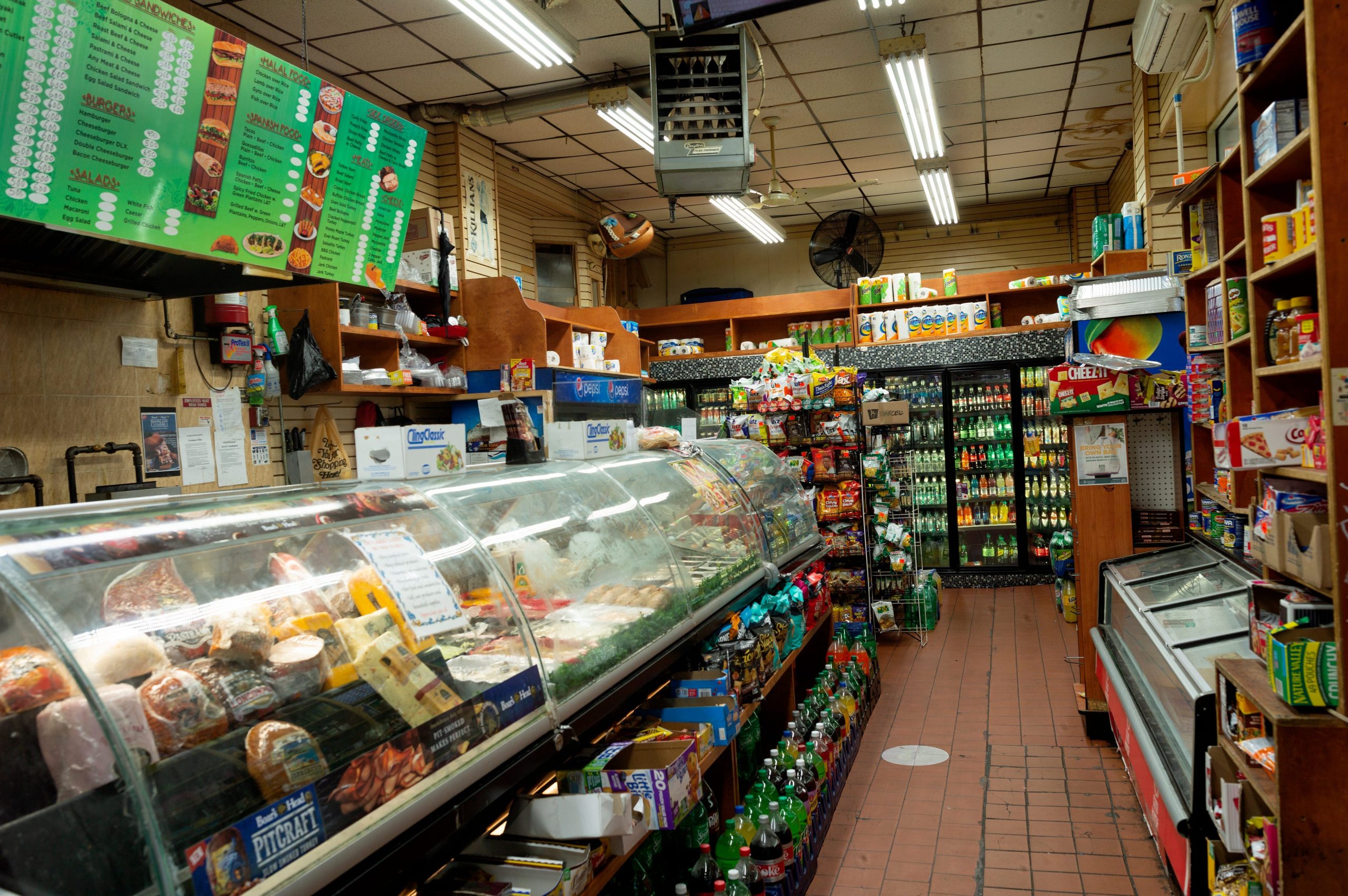 A brightly lit New York deli.