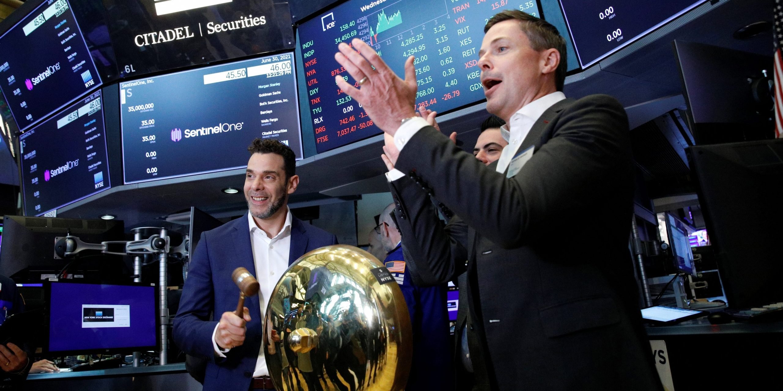 Tomer Weingarten, CEO of SentinelOne, a cybersecurity firm, rings a ceremonial bell during his company’s IPO at the New York Stock Exchange (NYSE) in New York City, U.S., June 30, 2021.