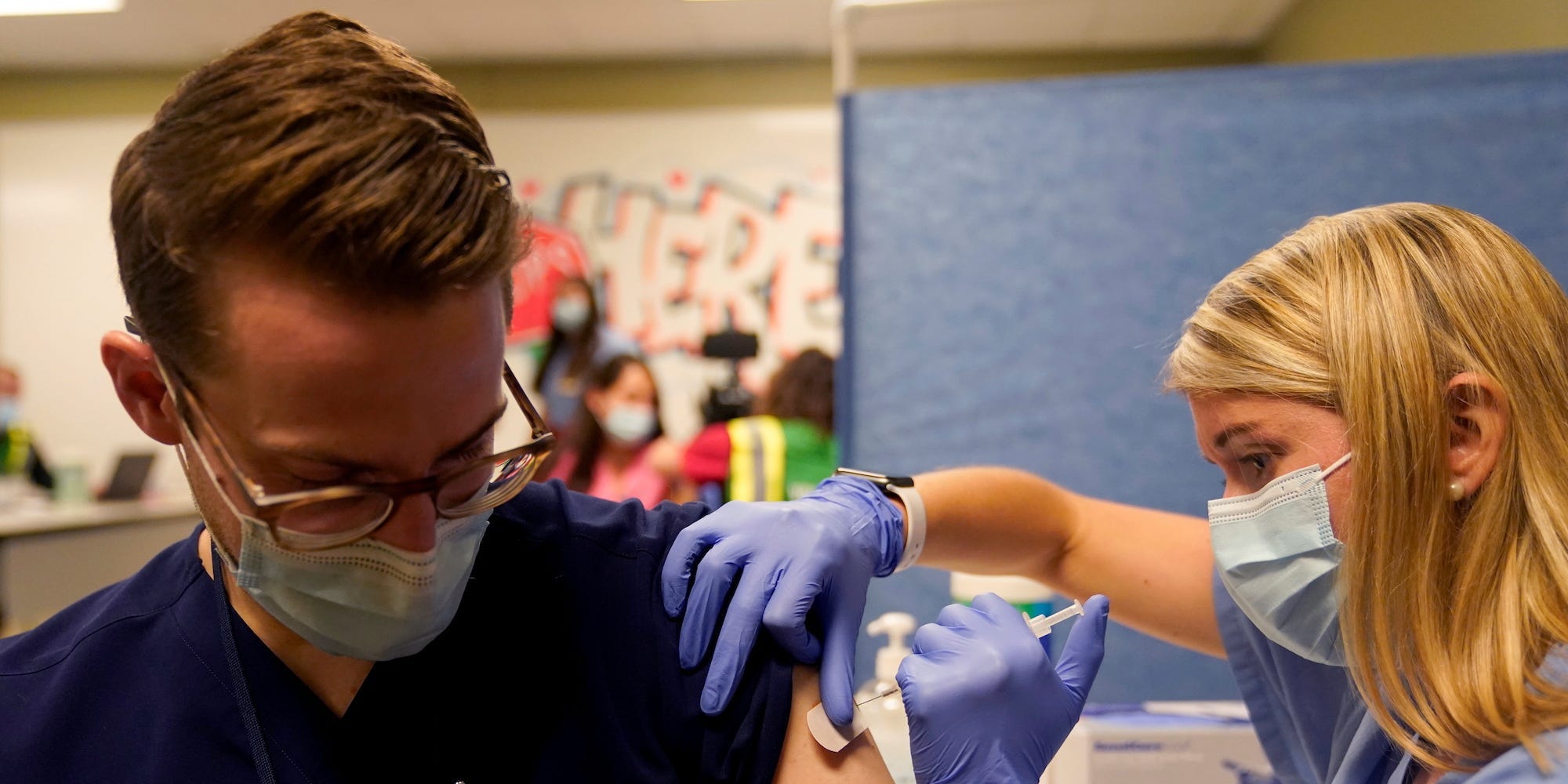 Fourth-year medical student Anna Roesler administers the Pfizer-BioNTech coronavirus disease (COVID-19) vaccine at Indiana University Health, Methodist Hospital in Indianapolis, Indiana, U.S., December 16, 2020.