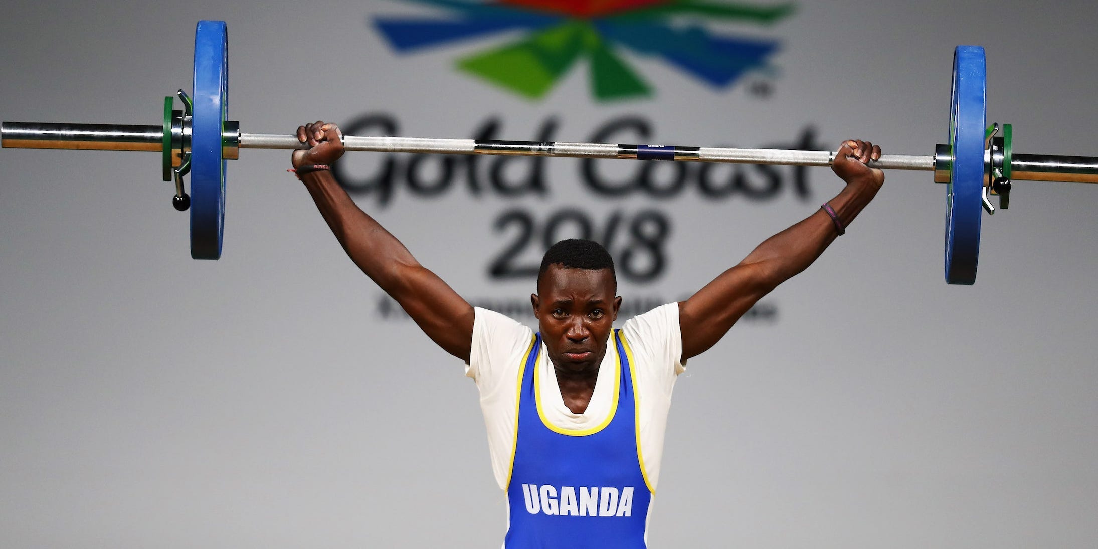 Julius Ssekitoleko of Uganda competes during the Weightlifting Men's 56kg Final on day one of the Gold Coast 2018 Commonwealth Games at Carrara Sports and Leisure Centre on April 5, 2018 on the Gold Coast, Australia.