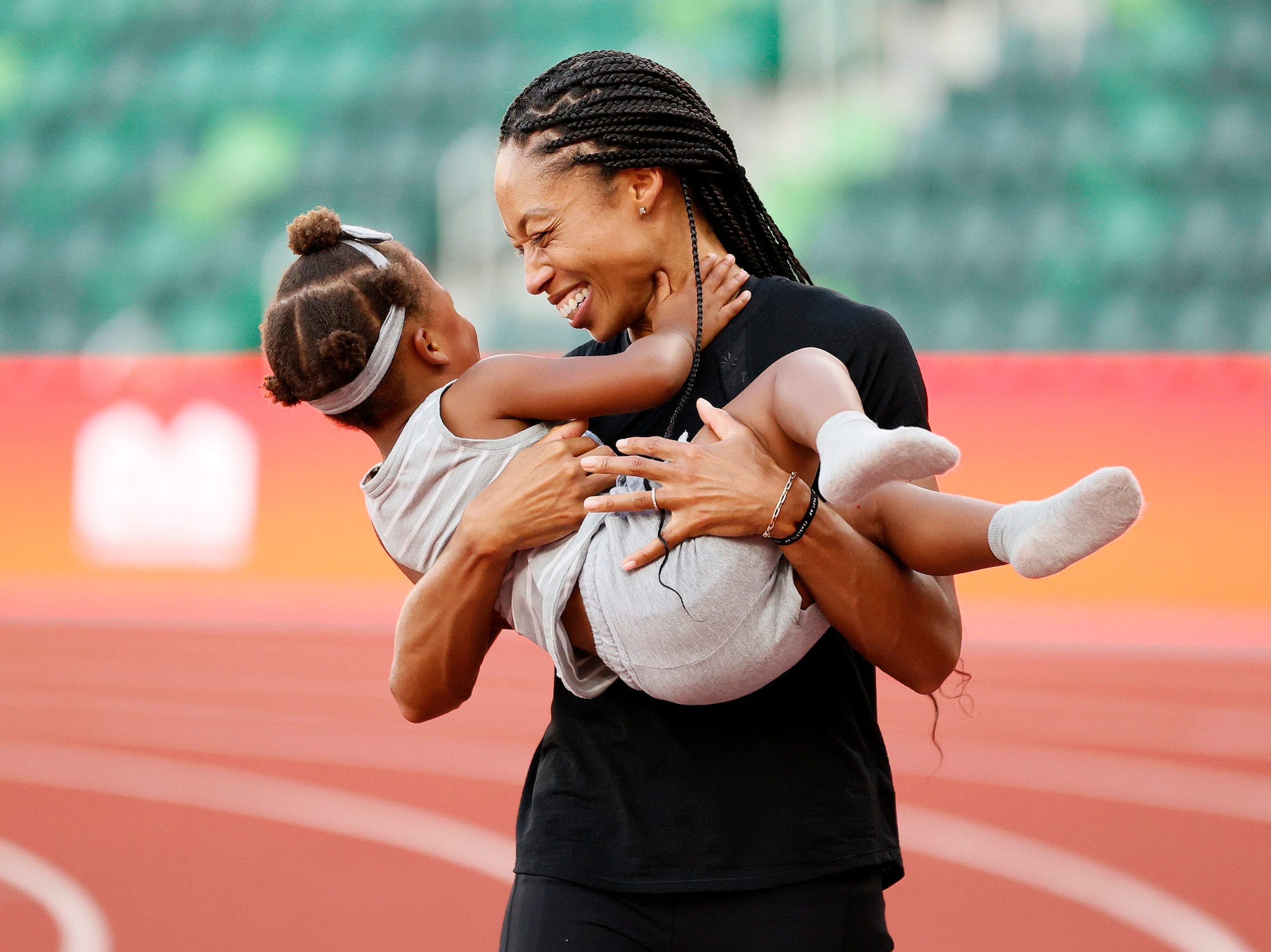 Allyson Felix celebrates with her daughter Camryn after day nine of the 2020 U.S. Olympic Track & Field Team Trials at Hayward Field on June 26, 2021 in Eugene, Oregon.