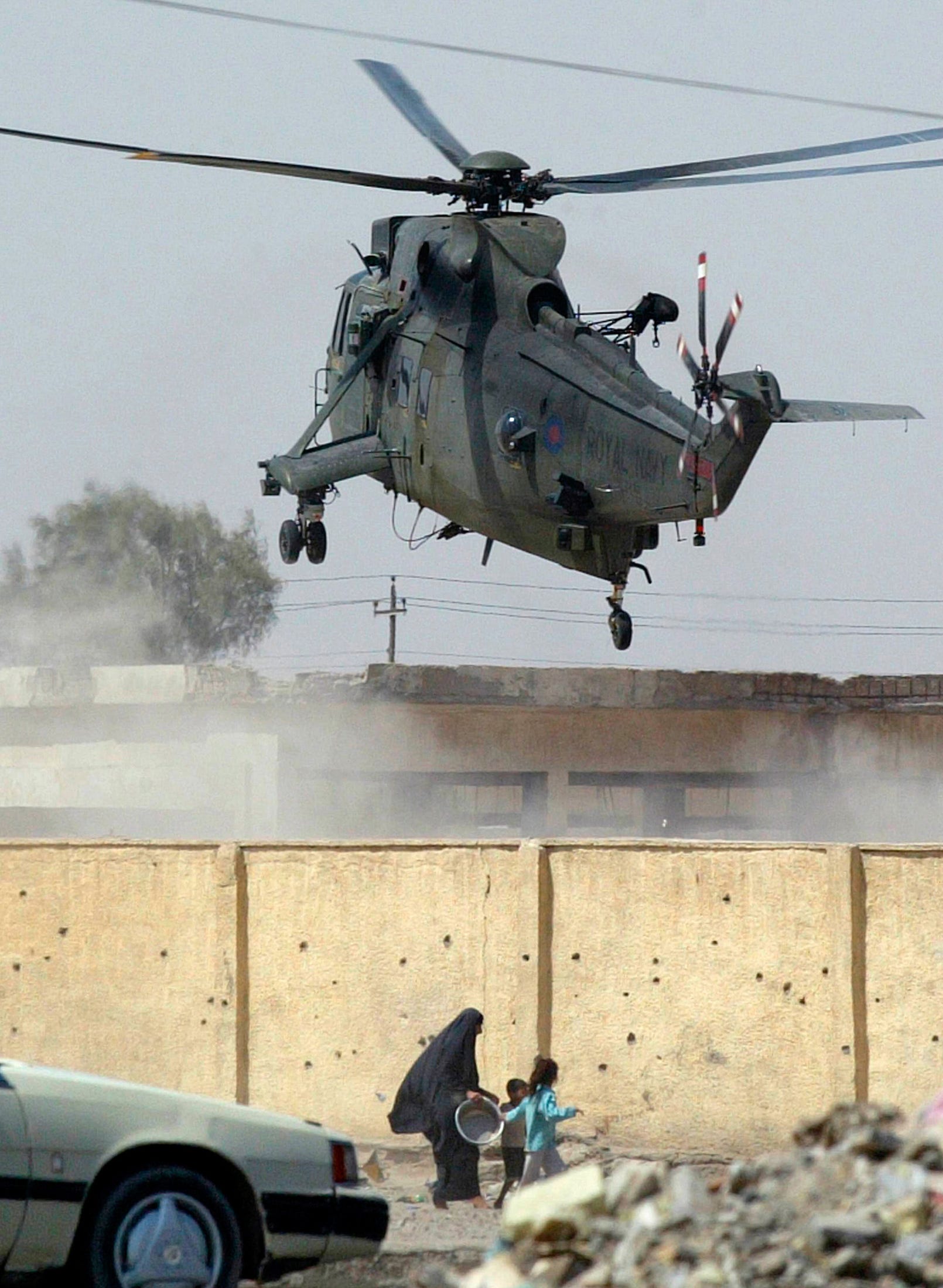 A British military helicopter lands in Basra Iraq