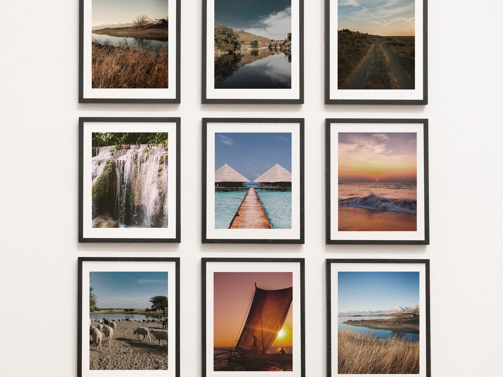 A three by three grid of framed photographs hanging on a wall