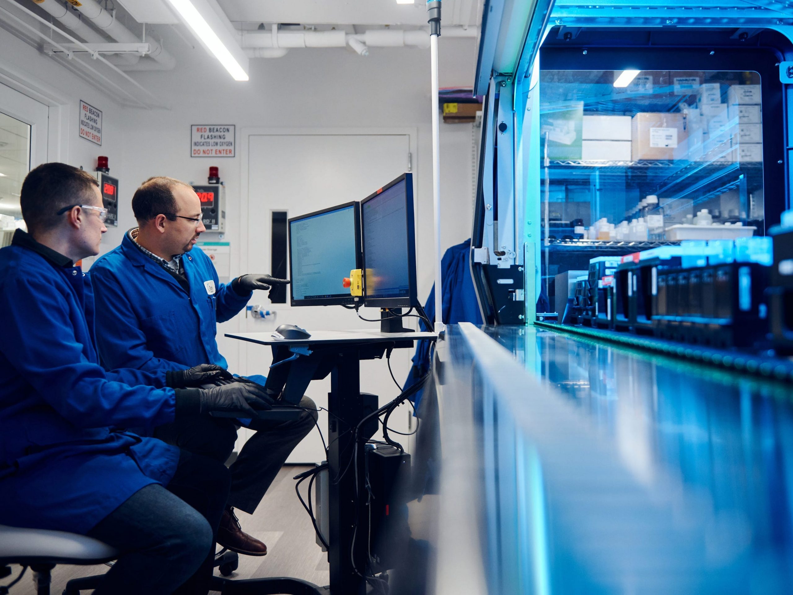 Scientists at work in Beam Therapeutics' laboratory in Cambridge, Massachusetts