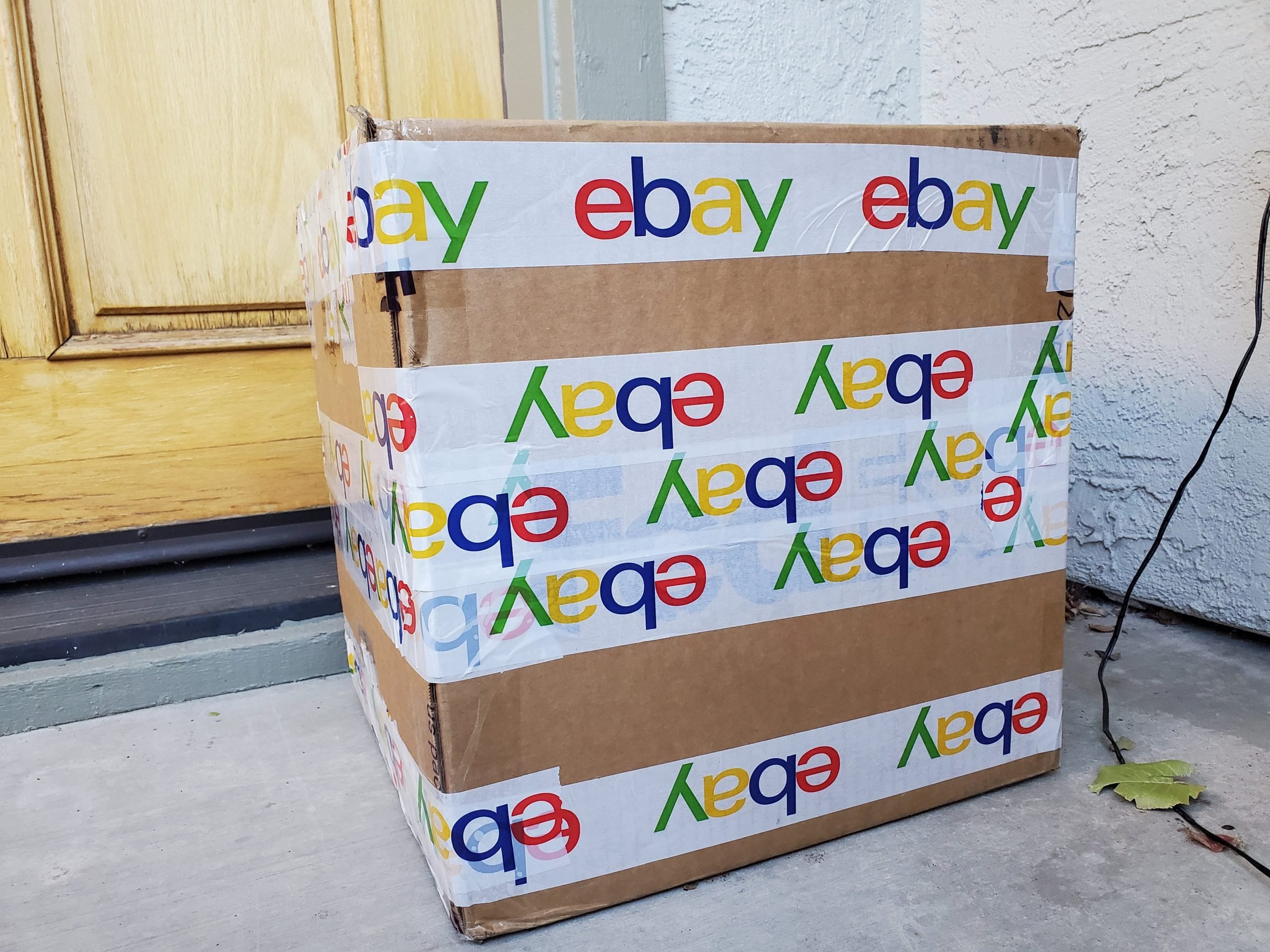 eBay box left outside a door.