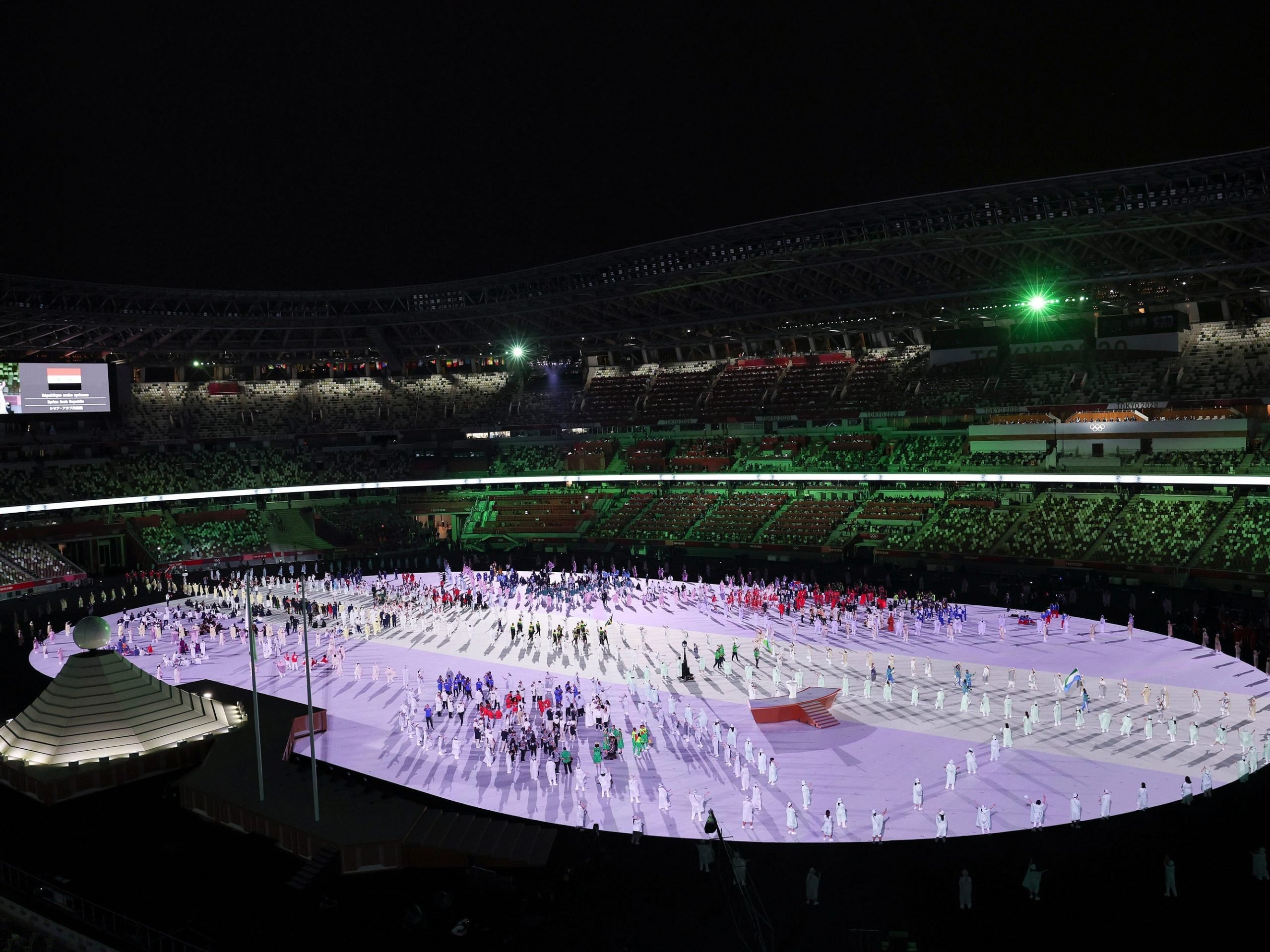 Performers gather during The Tokyo Olympics opening ceremony