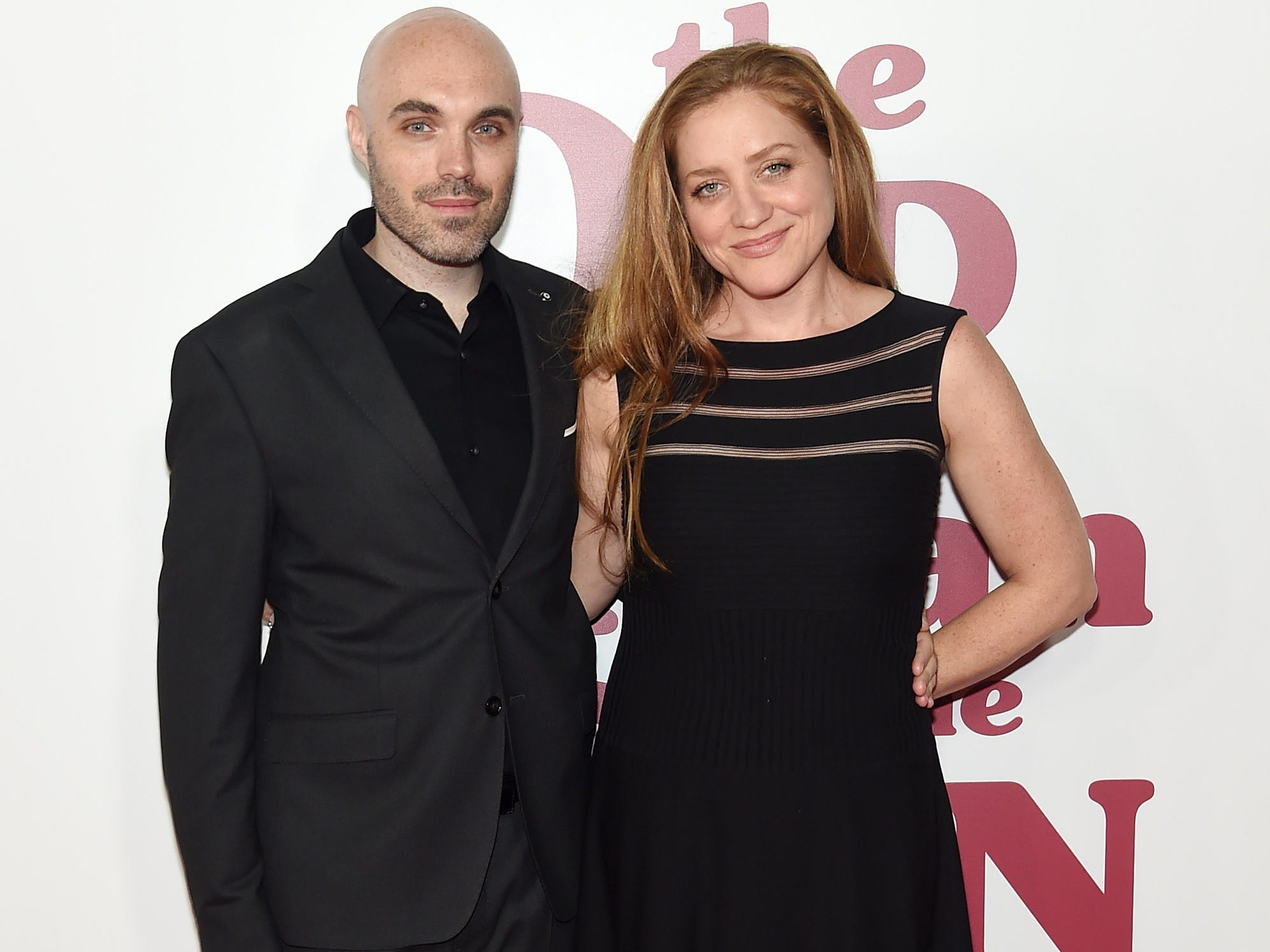 david lowery and augustine frizzell standing on the red carpet