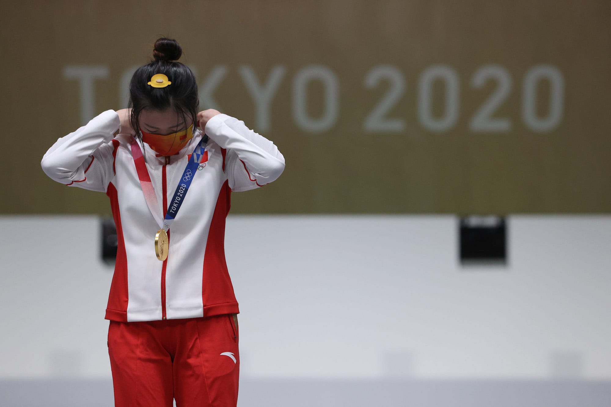 Qian Yang of Team China wins the gold medal during the 10m Air Rifle Women's event on day one of the Tokyo 2020 Olympic Games at Asaka Shooting Range